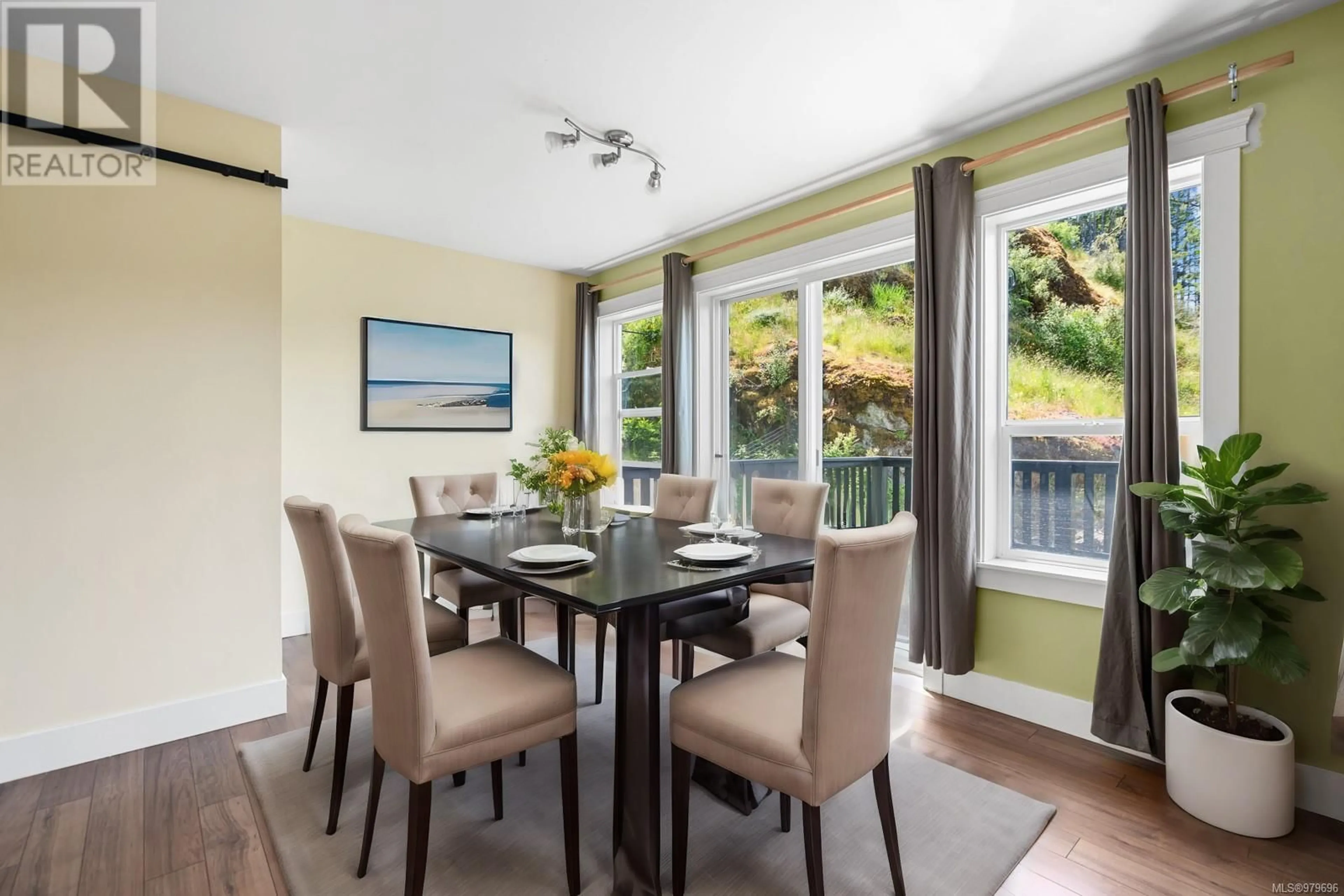 Dining room, wood floors, cottage for 3040 Otter Point Rd, Sooke British Columbia V9Z0J4