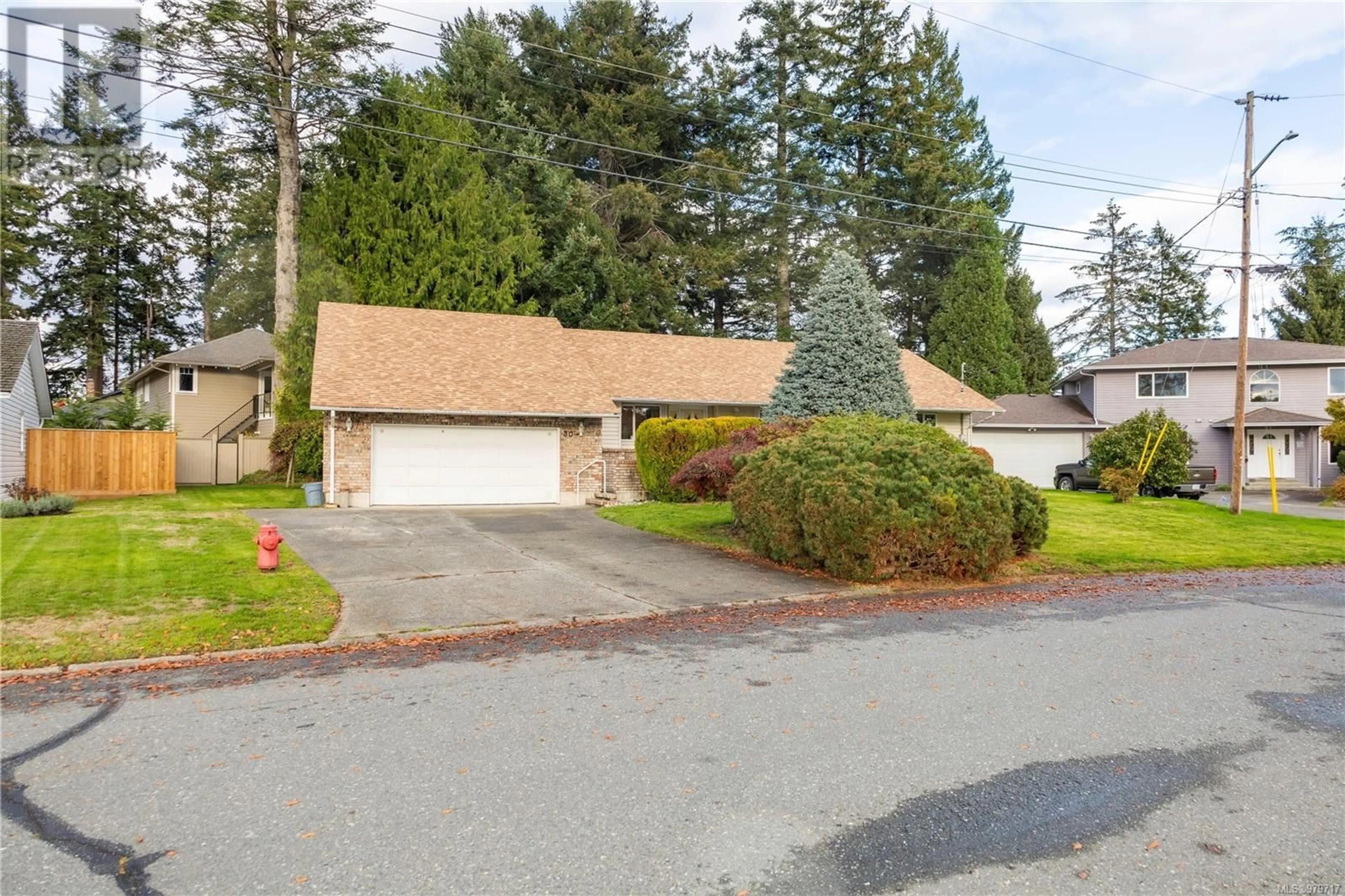 Frontside or backside of a home, the street view for 30 Oregon Rd, Campbell River British Columbia V9W5T1