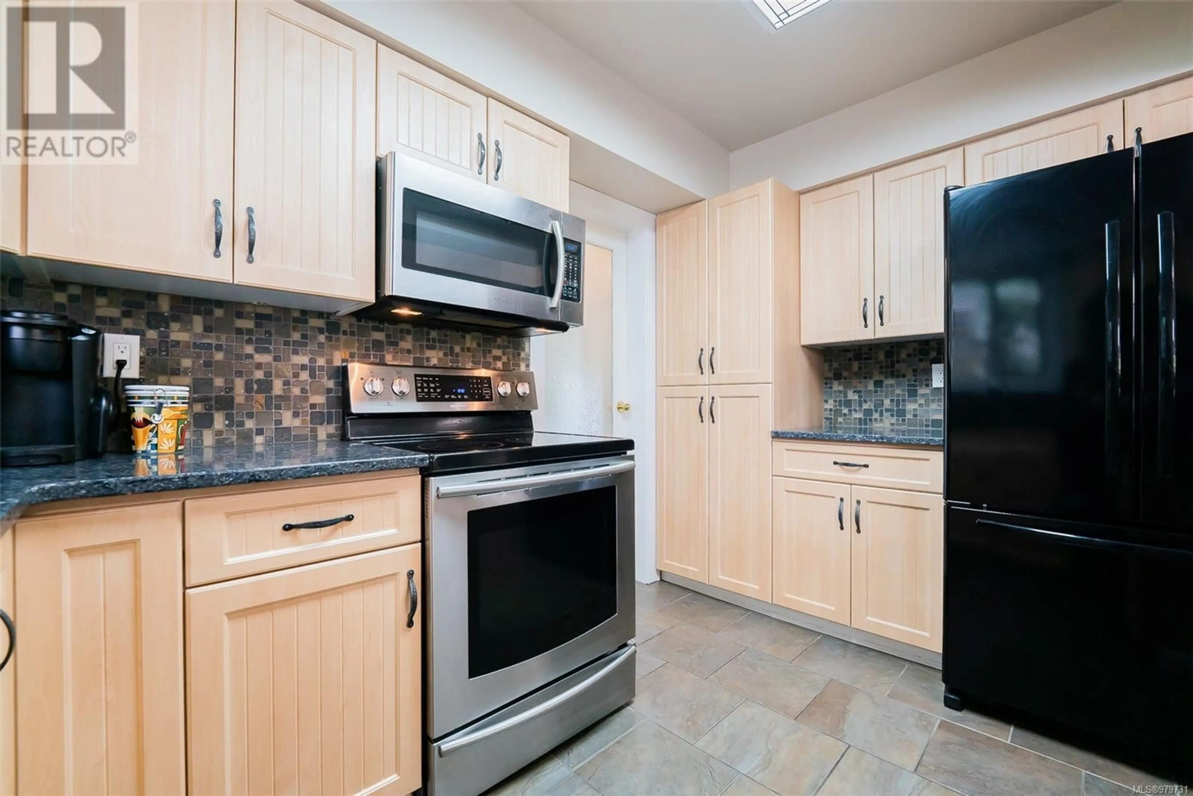 Standard kitchen, ceramic floors, cottage for 4116 Orchard Cir, Nanaimo British Columbia V9T4C6