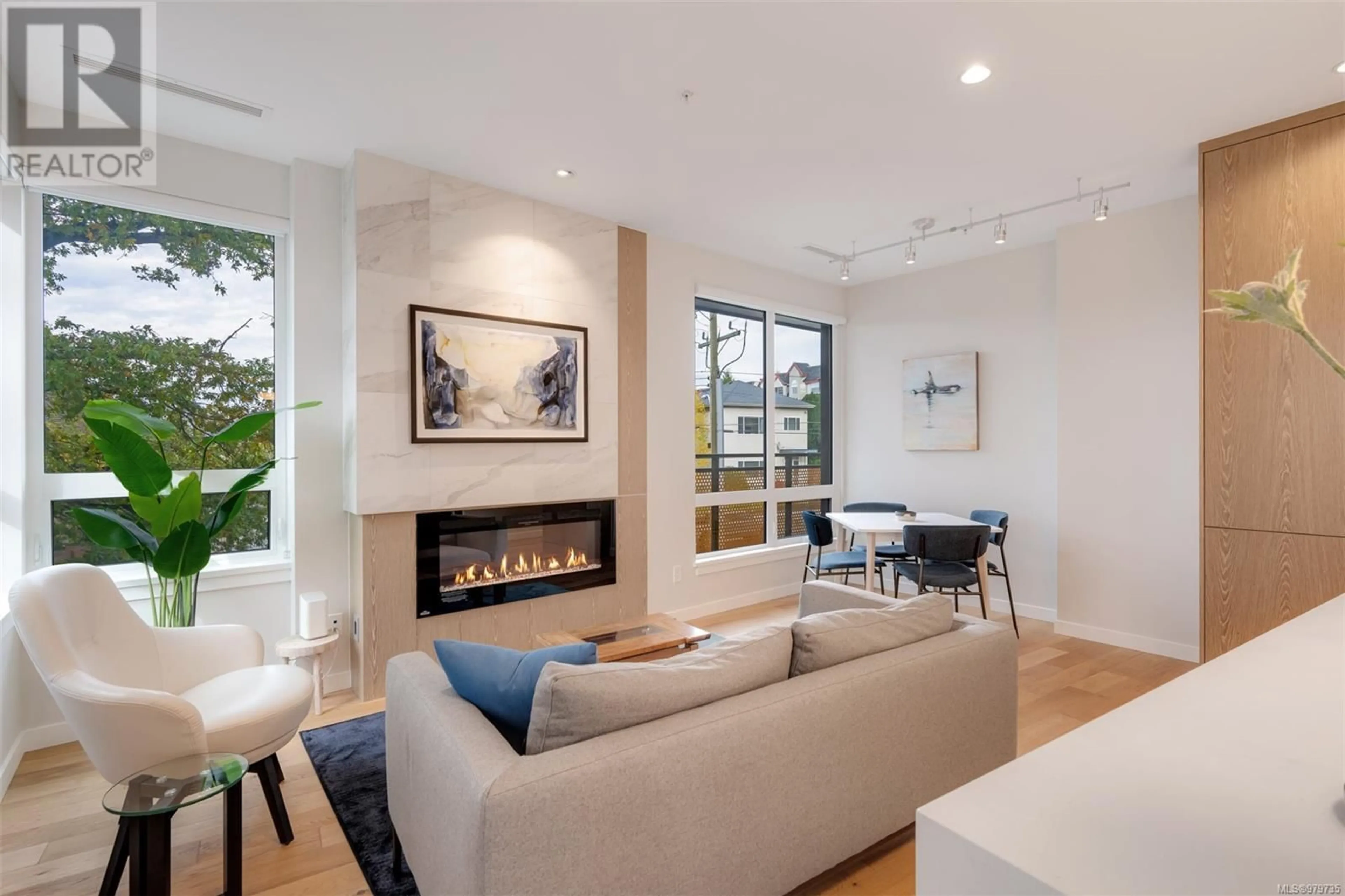 Living room, wood floors for 211 1201 Fort St, Victoria British Columbia V8V0G1