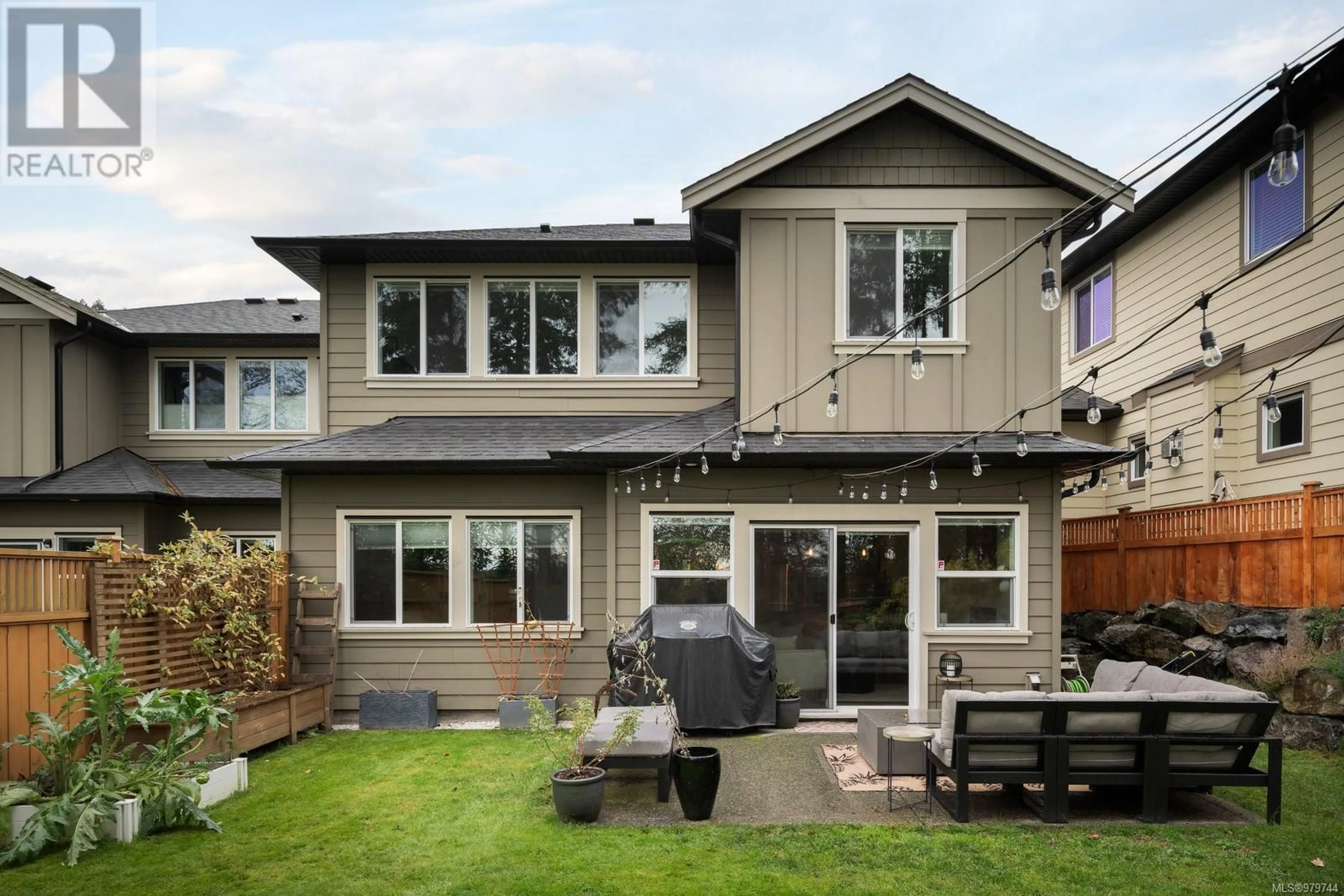 Frontside or backside of a home, the fenced backyard for 3 Massey Pl, View Royal British Columbia V9B0S9