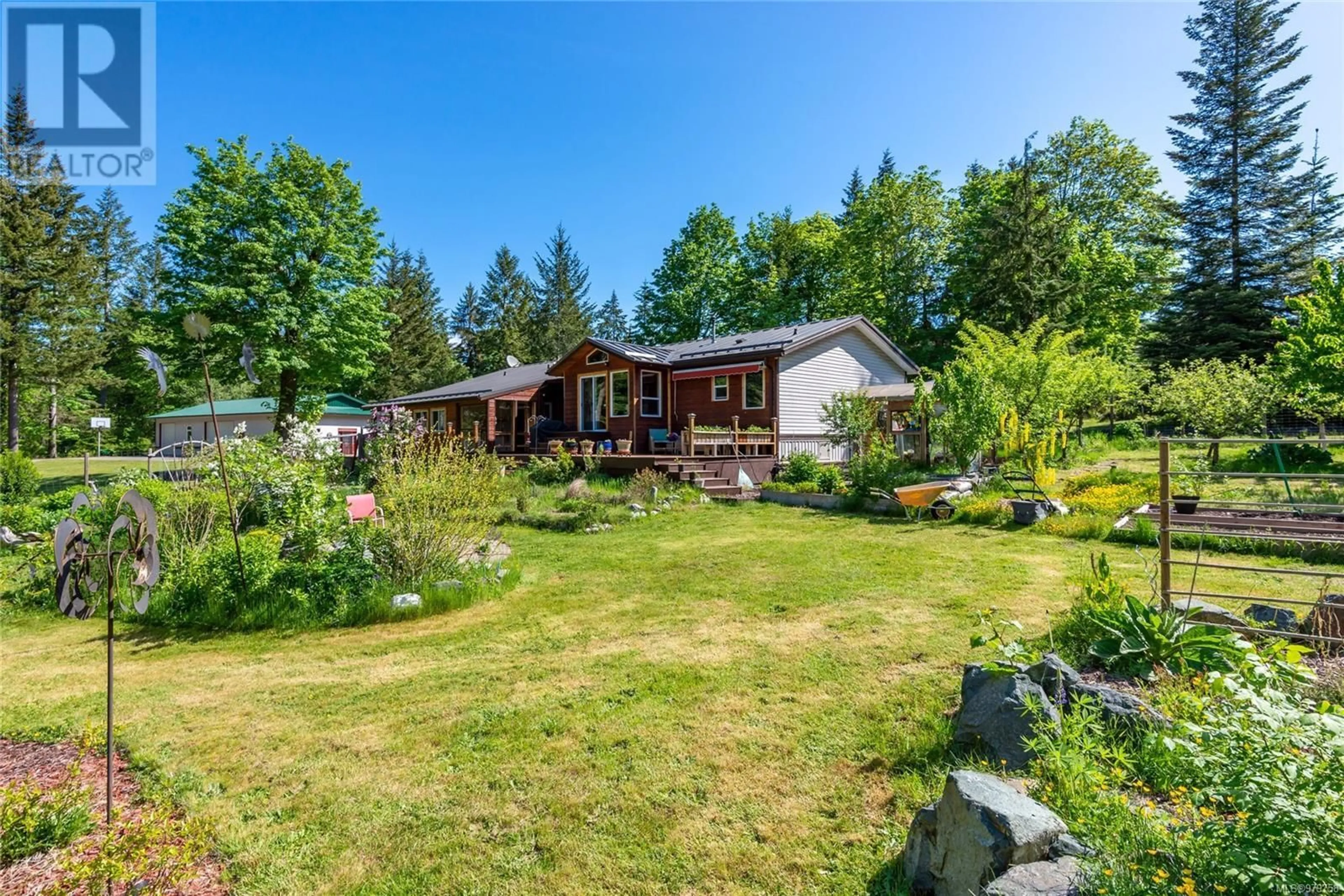 Frontside or backside of a home, cottage for 591 Green Rd, Quadra Island British Columbia V0P1H0