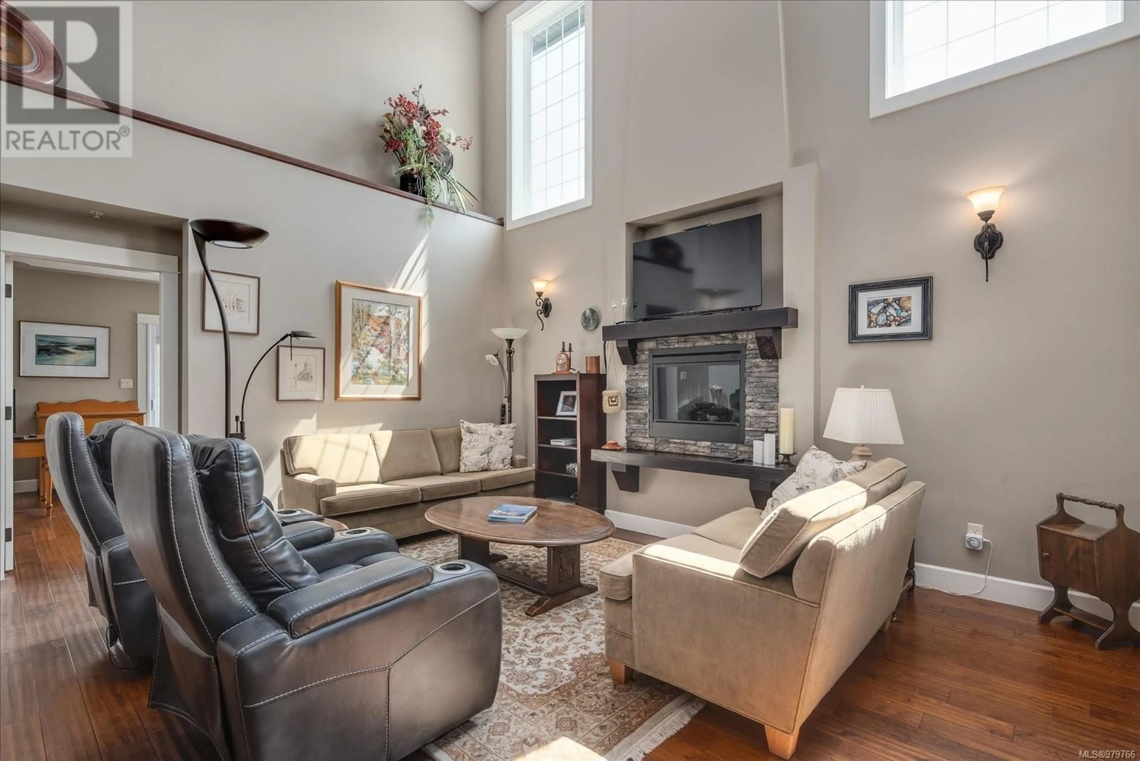 Living room, wood floors for 101 6196 Lexington Pl, Nanaimo British Columbia V9V0A6