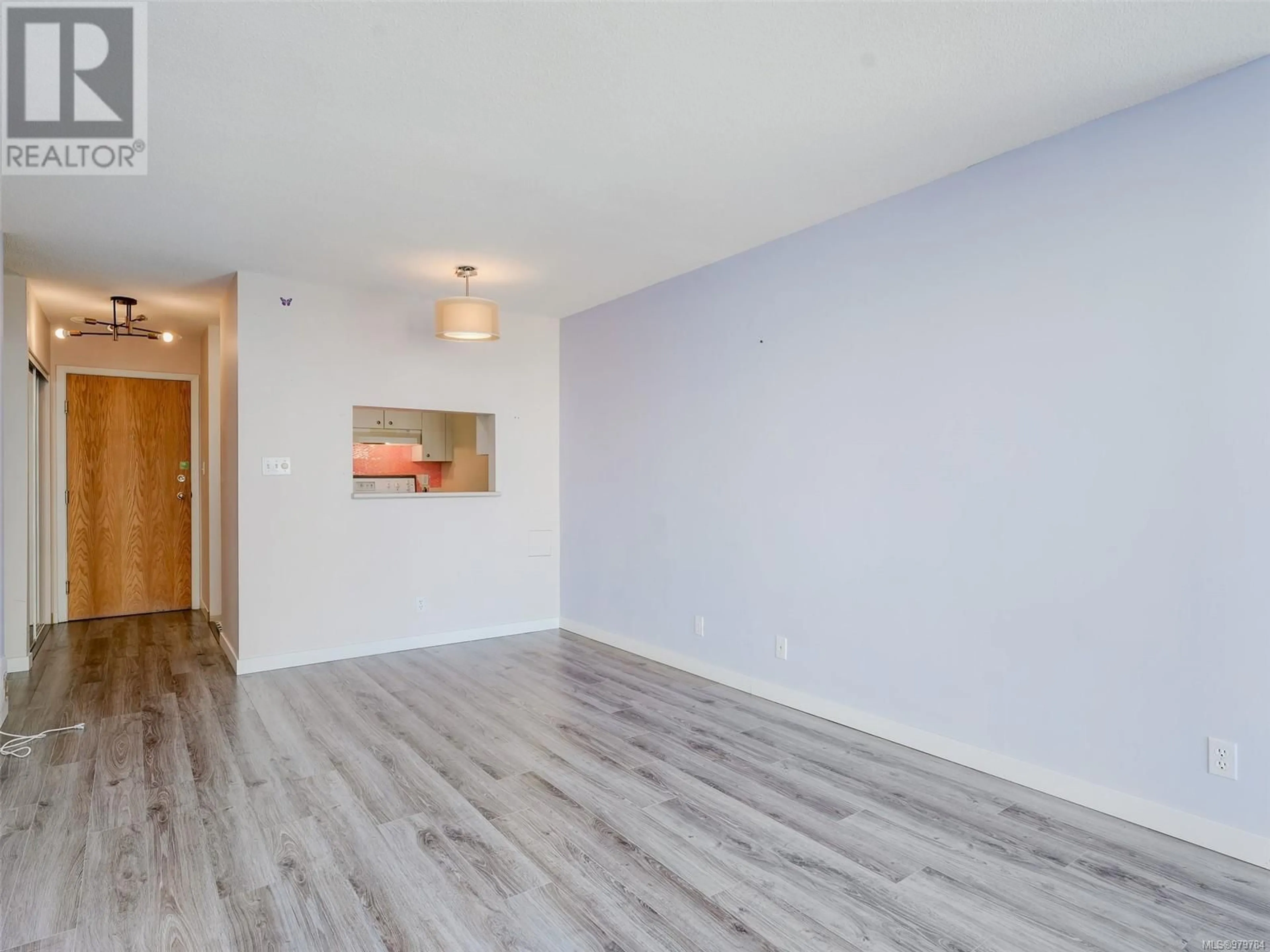 A pic of a room, wood floors for 807 835 View St, Victoria British Columbia V8W1K1