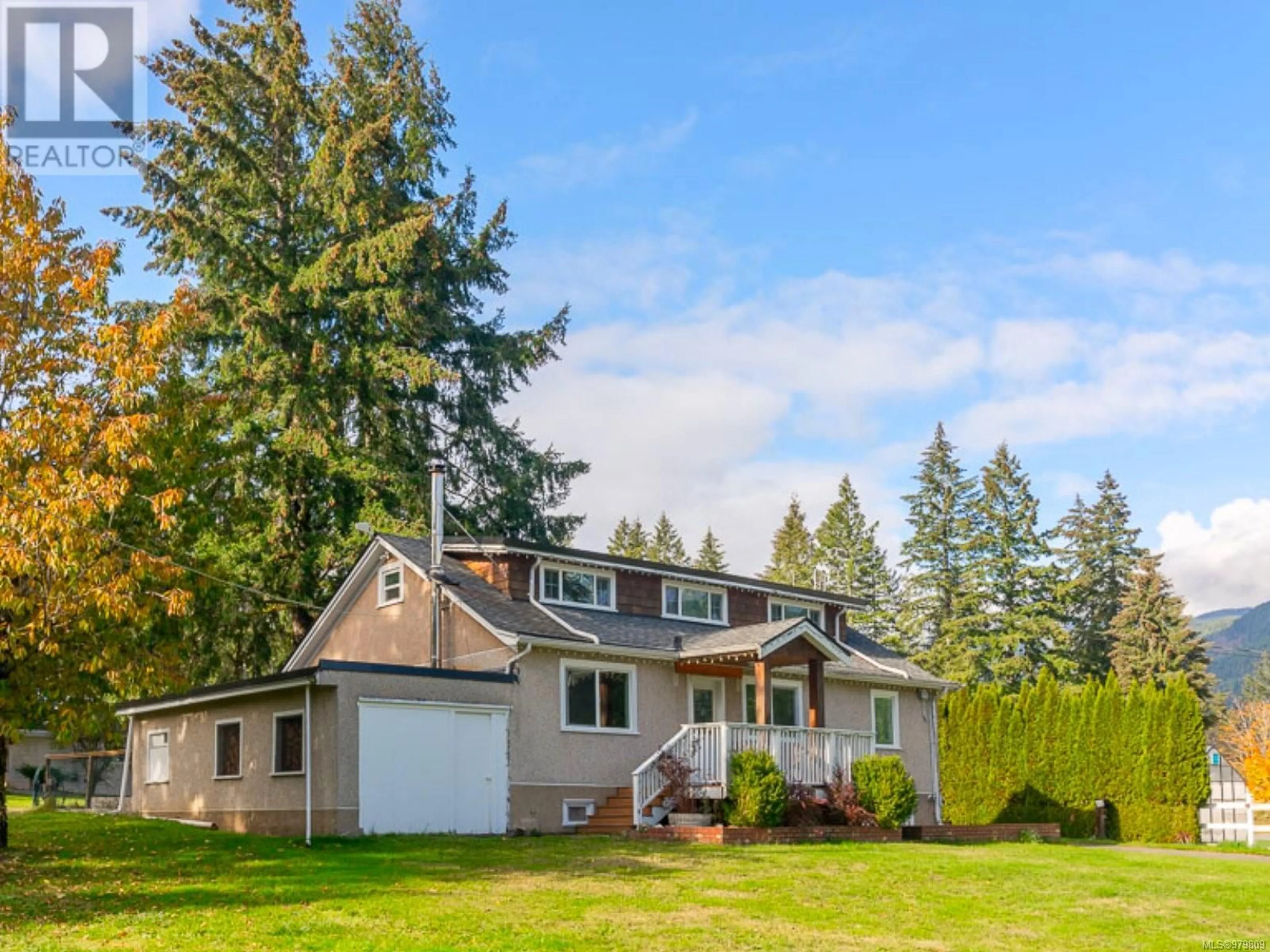 Frontside or backside of a home, the fenced backyard for 6412 Cherry Creek Rd, Port Alberni British Columbia V9Y8S9