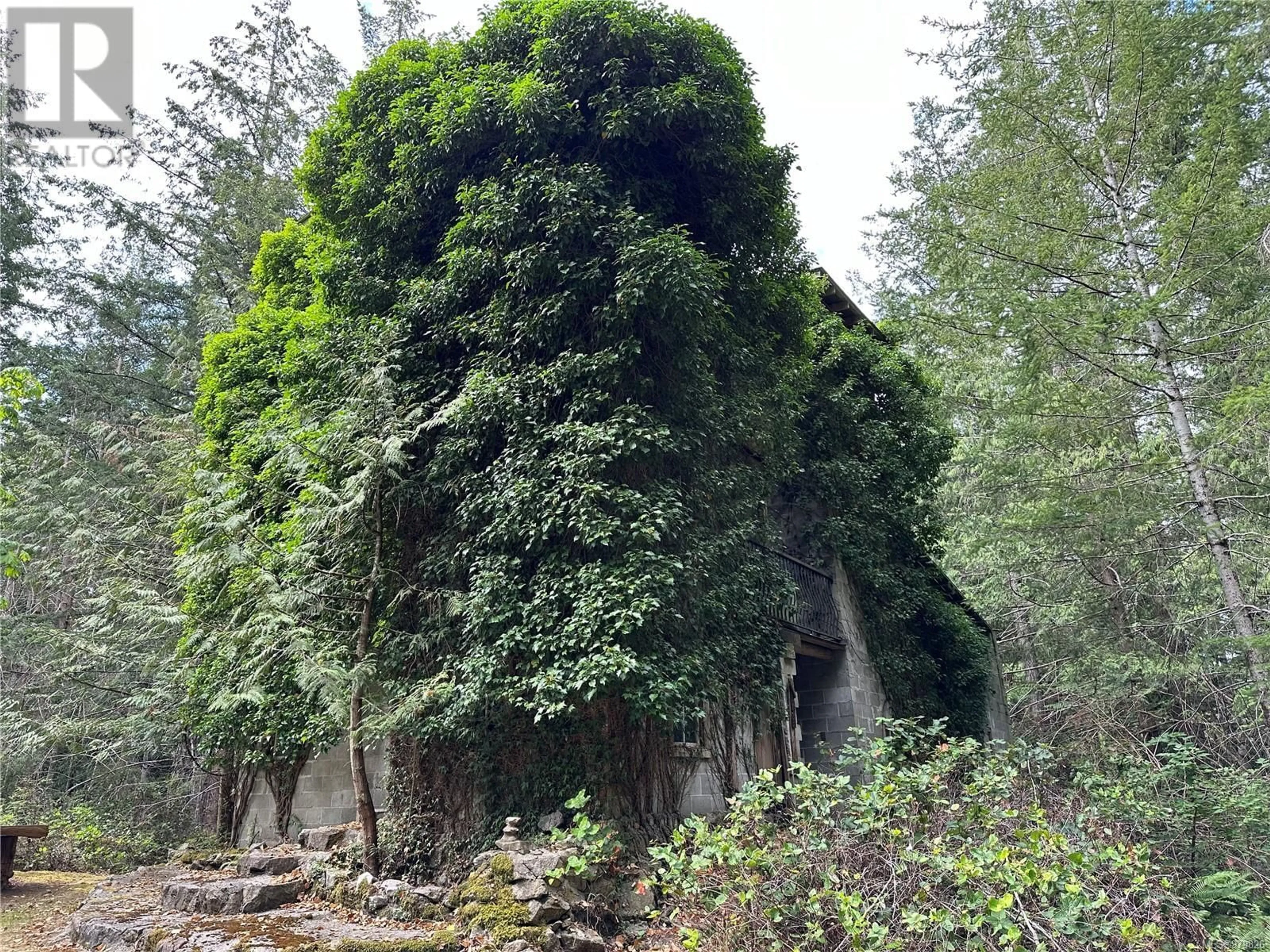 Frontside or backside of a home, forest for 1416 Manzanita Rd, Cortes Island British Columbia V0P1T0