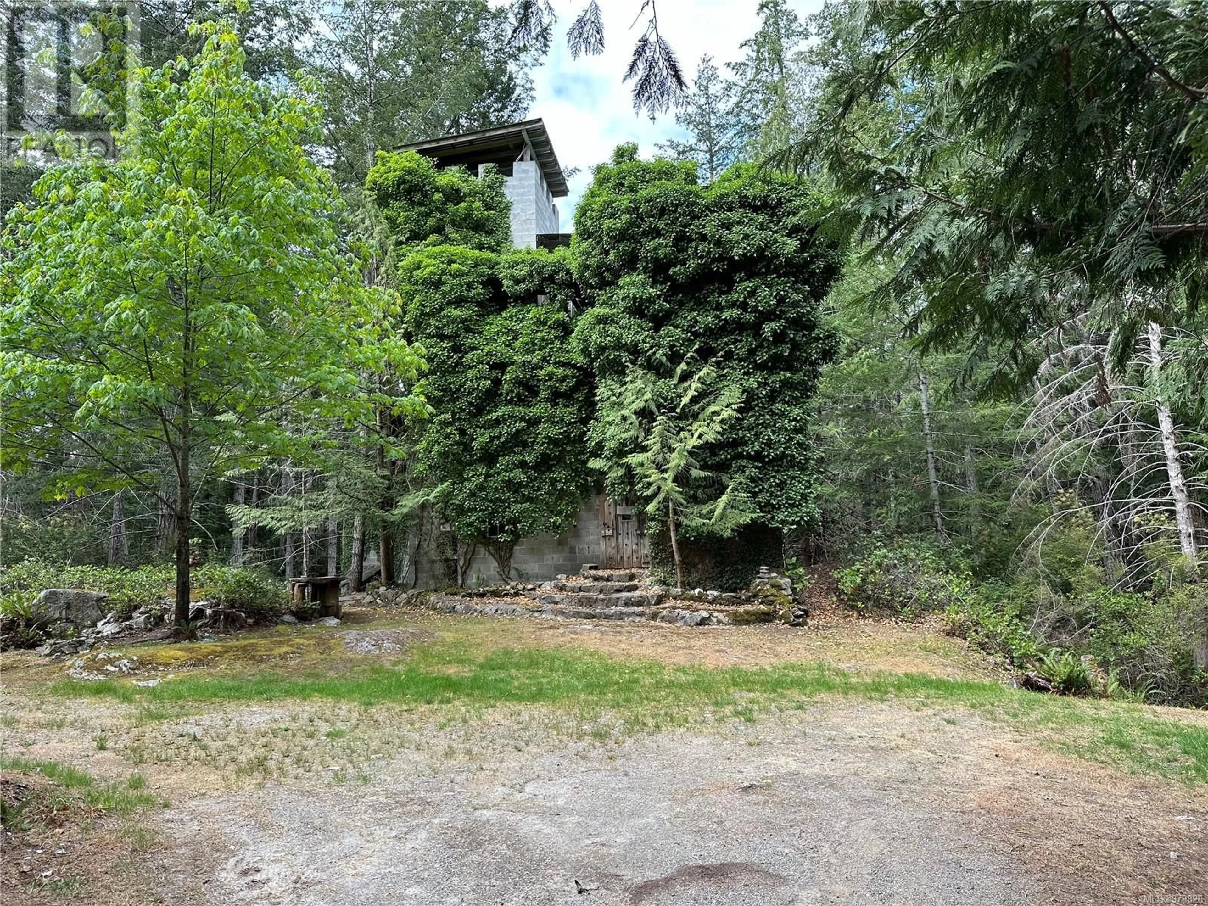 Frontside or backside of a home, cottage for 1416 Manzanita Rd, Cortes Island British Columbia V0P1T0