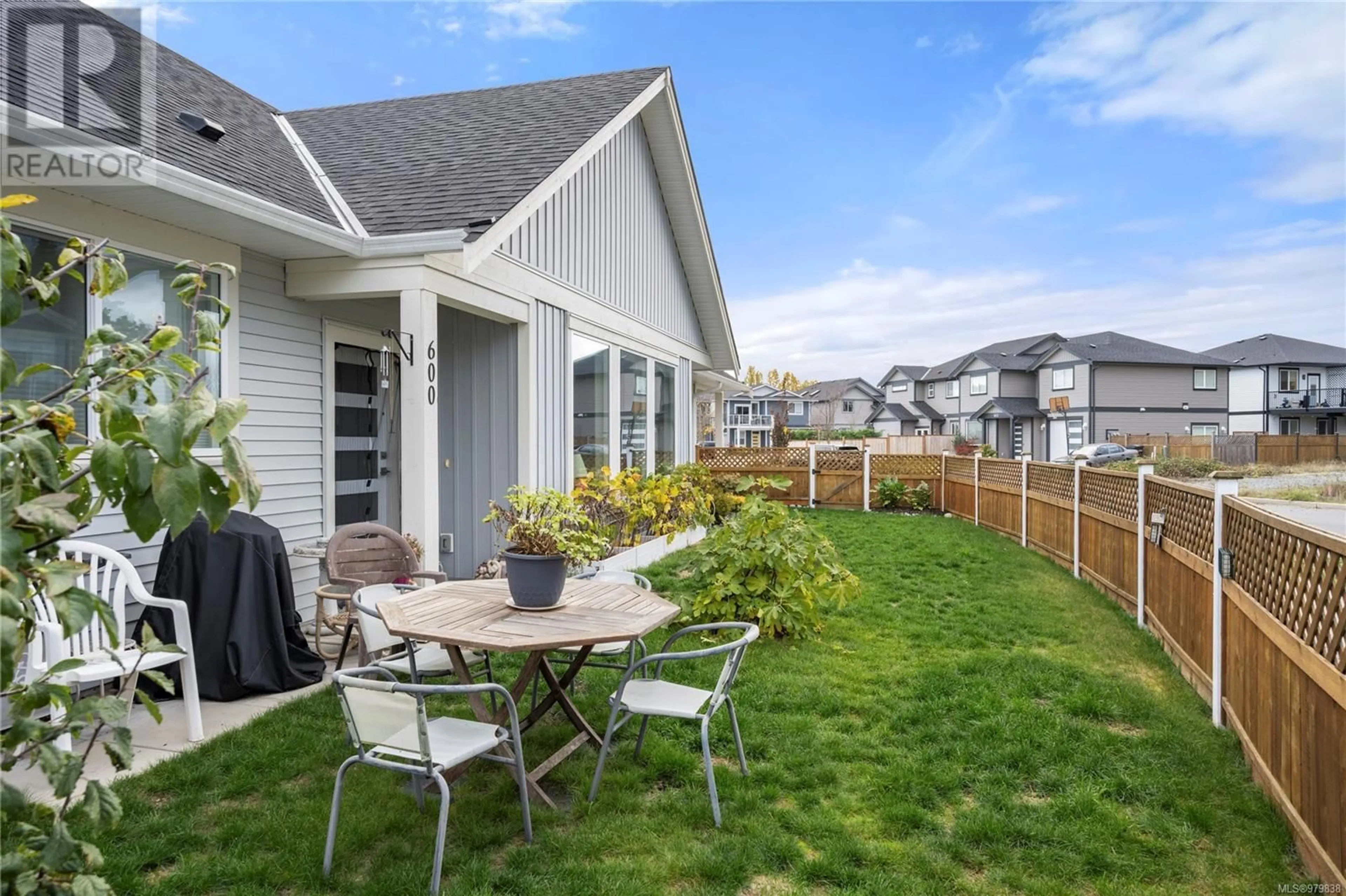 Patio, the fenced backyard for 600 Ravenswood Dr, Nanaimo British Columbia V9R0J6