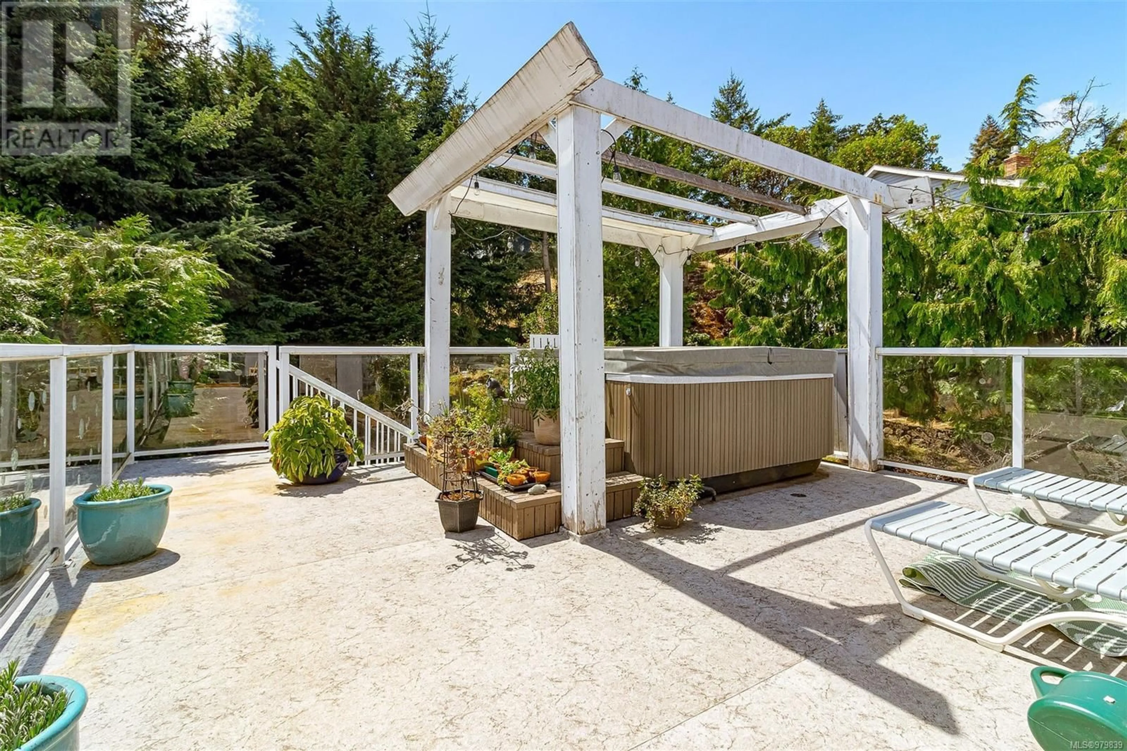 Patio, the fenced backyard for 711 Bexhill Rd, Colwood British Columbia V9C2N8