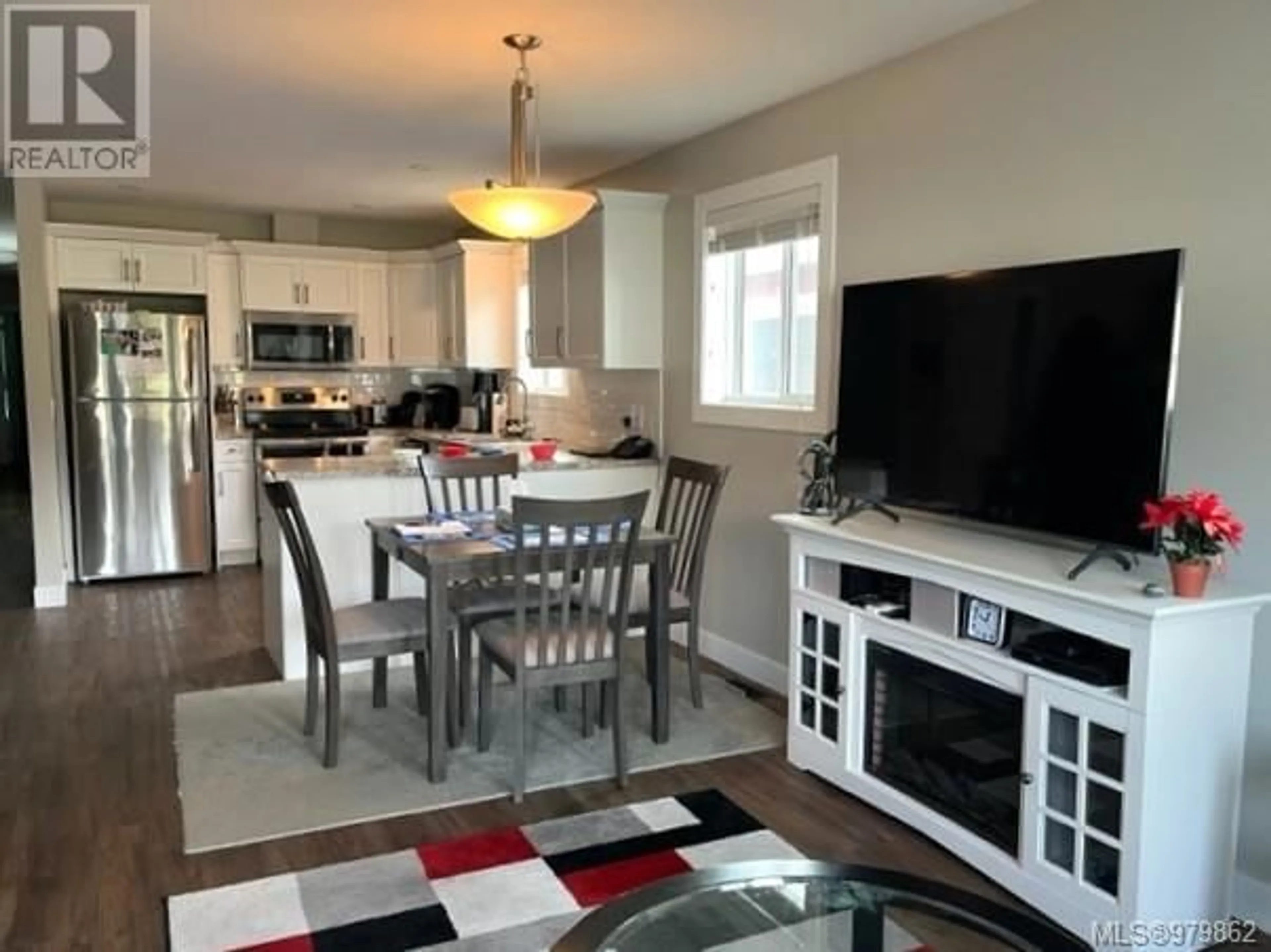 Open concept kitchen for 106 5700 Pierce Rd, Port Alberni British Columbia V9Y0A3