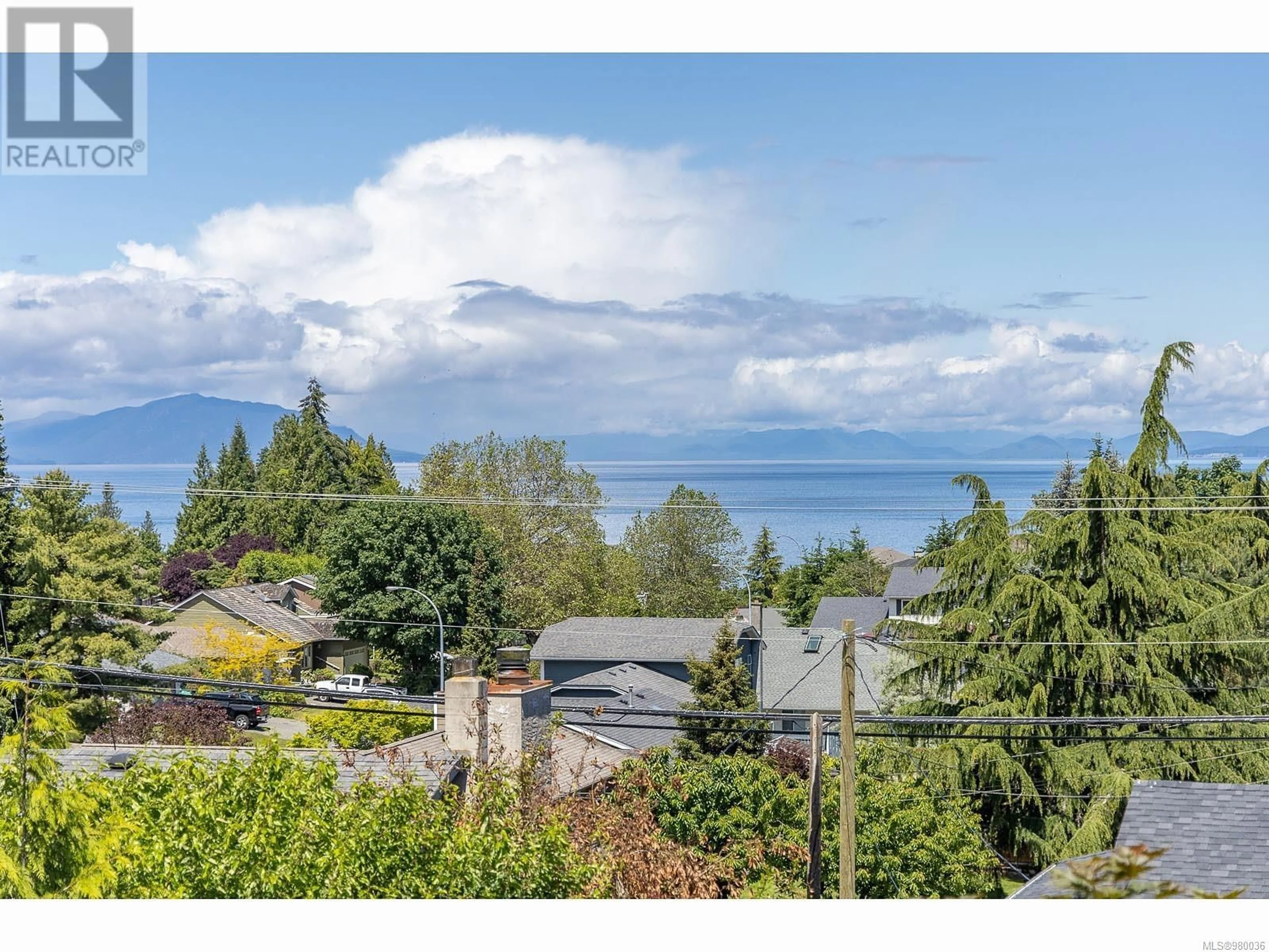 A pic from exterior of the house or condo, the fenced backyard for 5240 Toms Trnabt, Nanaimo British Columbia V9T5M9