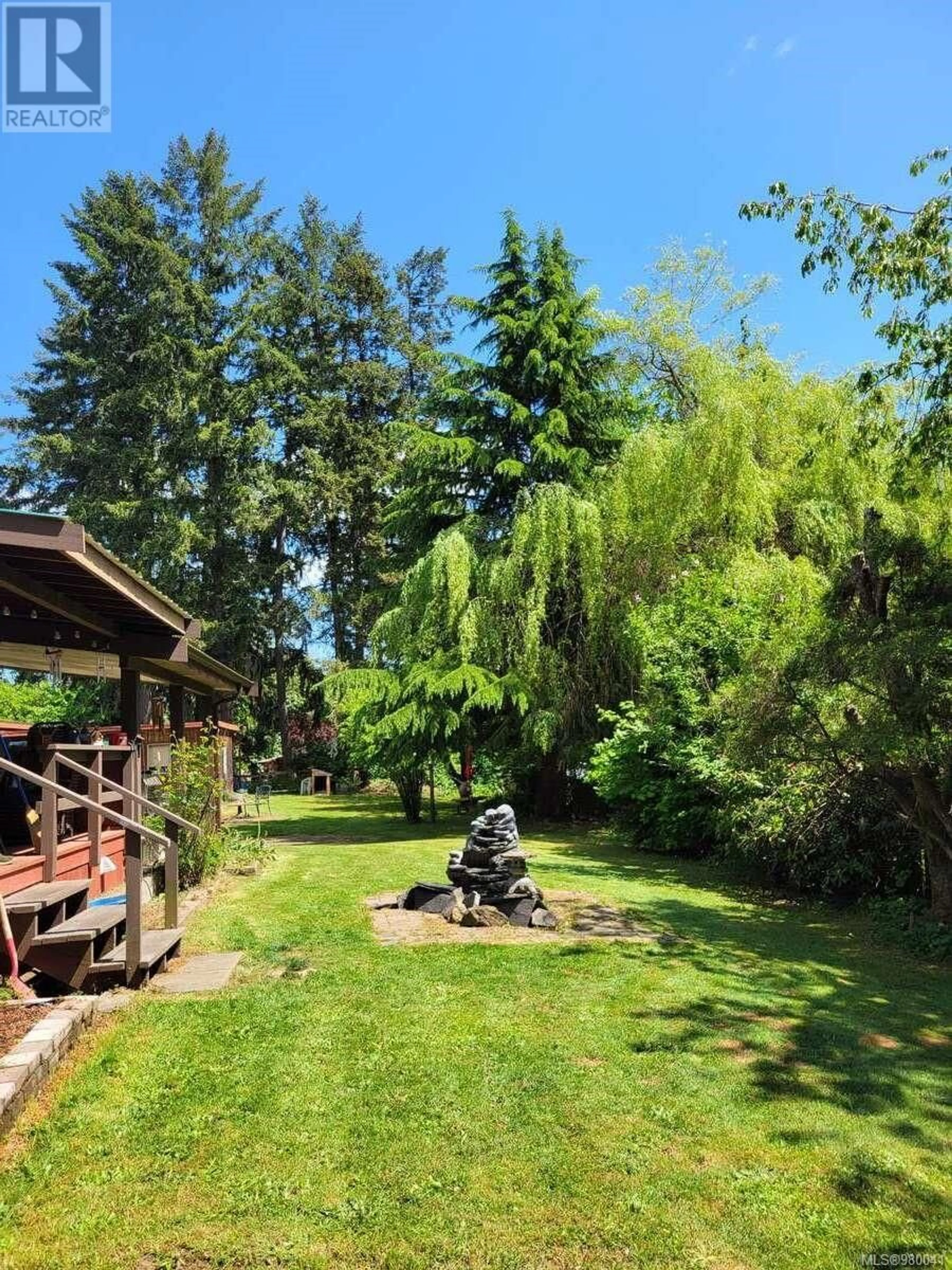 Patio, the fenced backyard for 6633 Bell McKinnon Rd, Duncan British Columbia V9L6B9