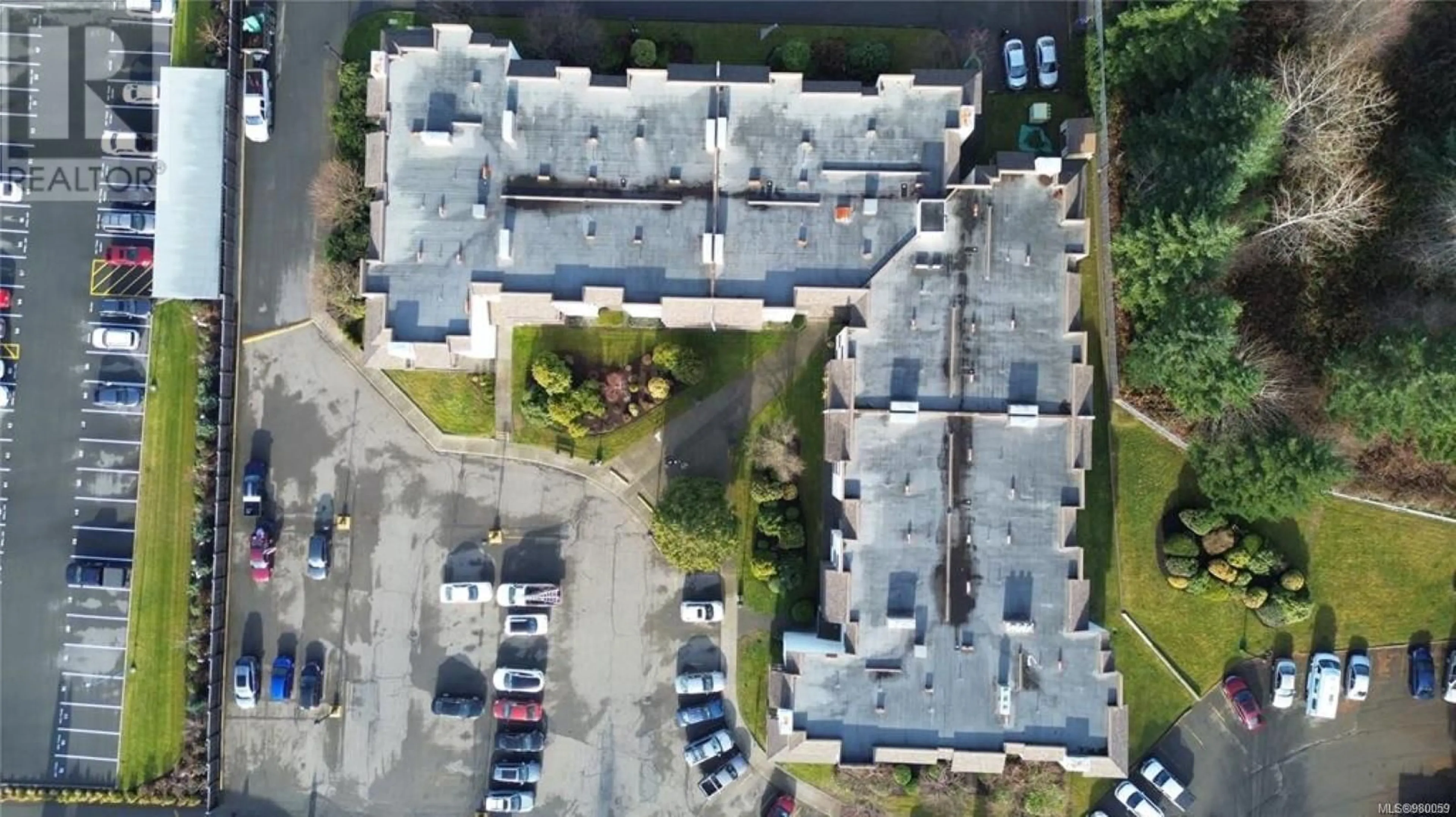 A pic from outside/outdoor area/front of a property/back of a property/a pic from drone, street for 208 - 585 DOGWOOD STREET, Campbell River British Columbia V9W6T6