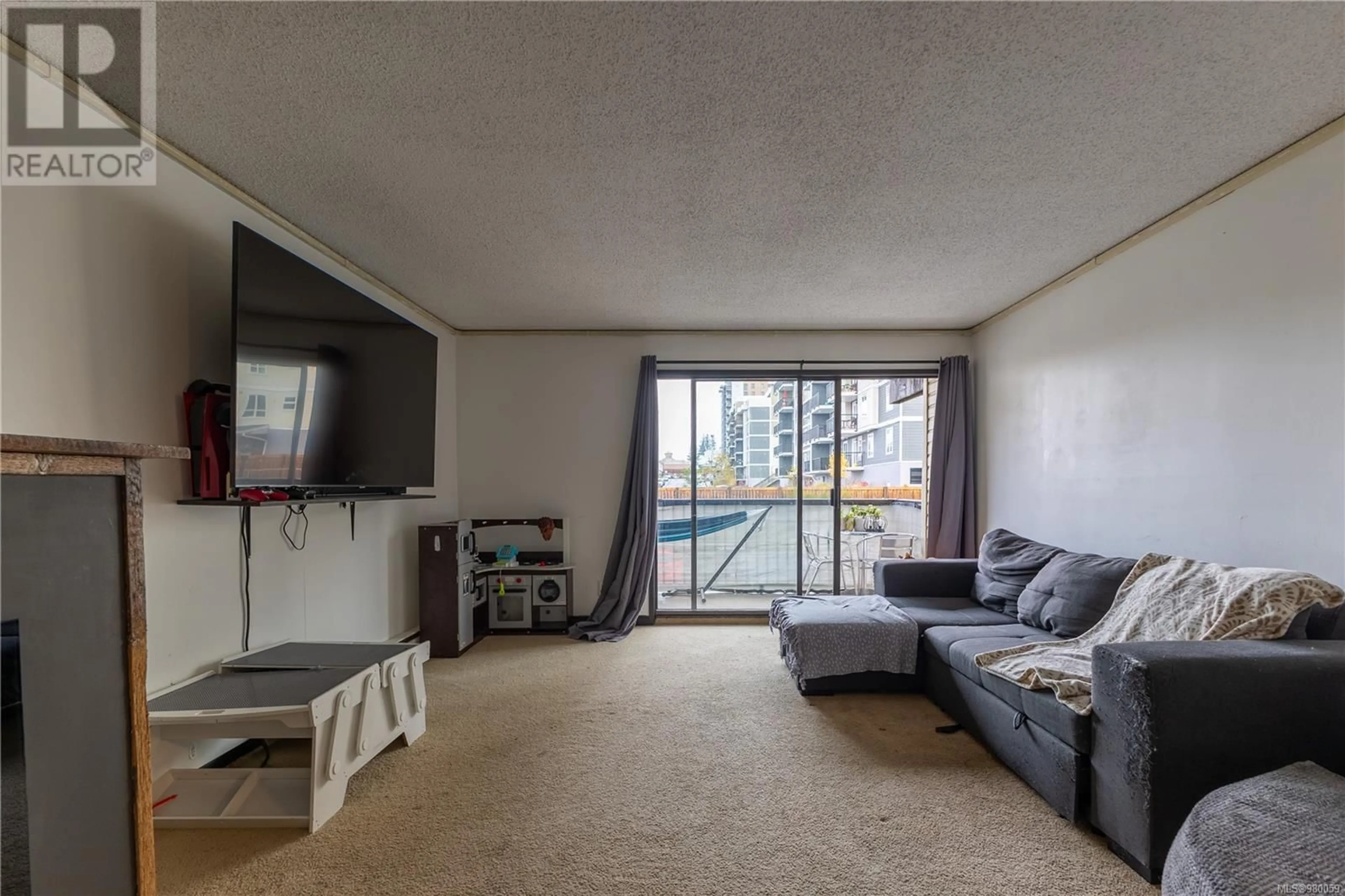 Living room with furniture, unknown for 208 - 585 DOGWOOD STREET, Campbell River British Columbia V9W6T6