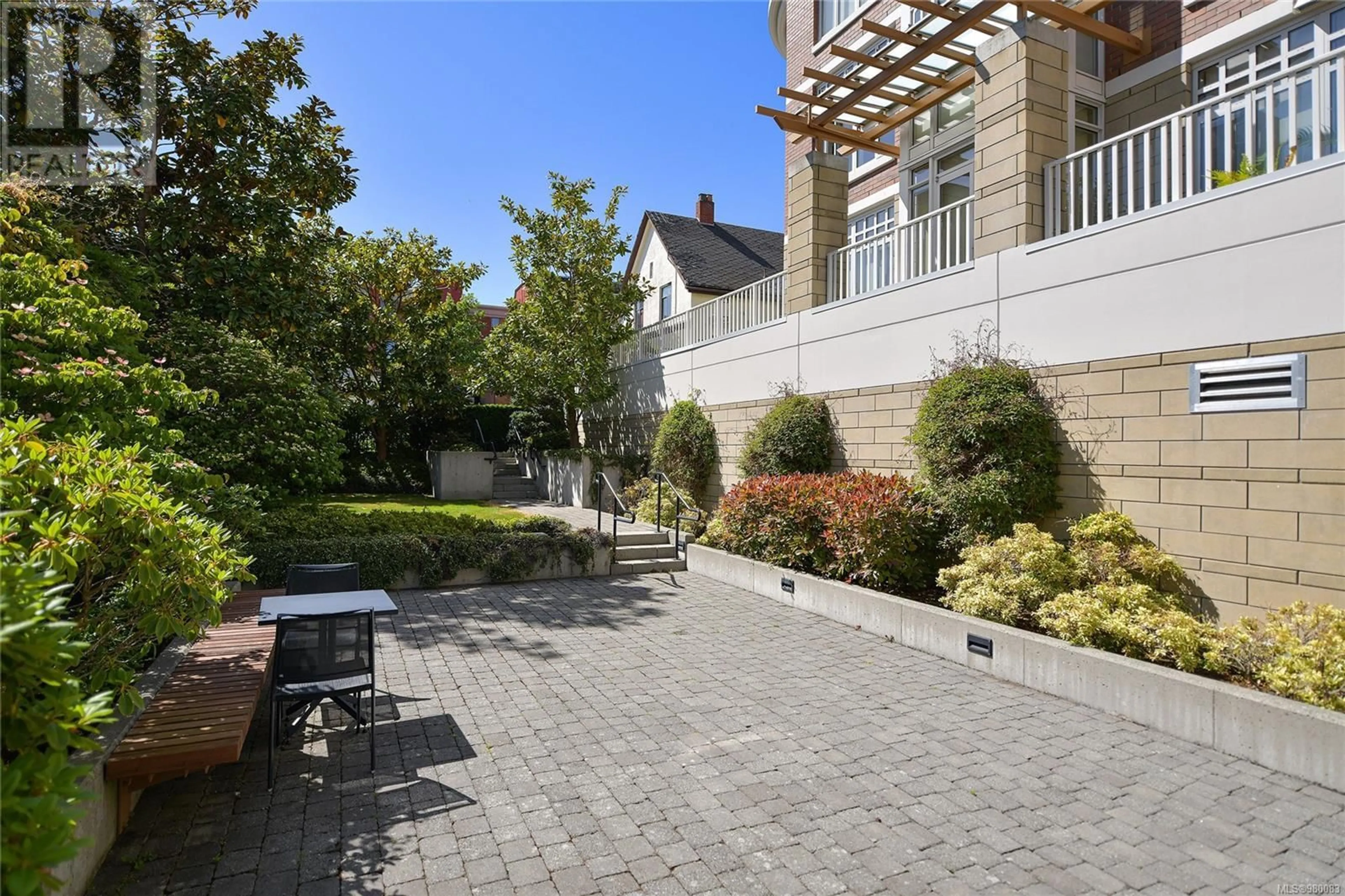 Patio, the fenced backyard for 215 999 Burdett Ave, Victoria British Columbia V8V3G7