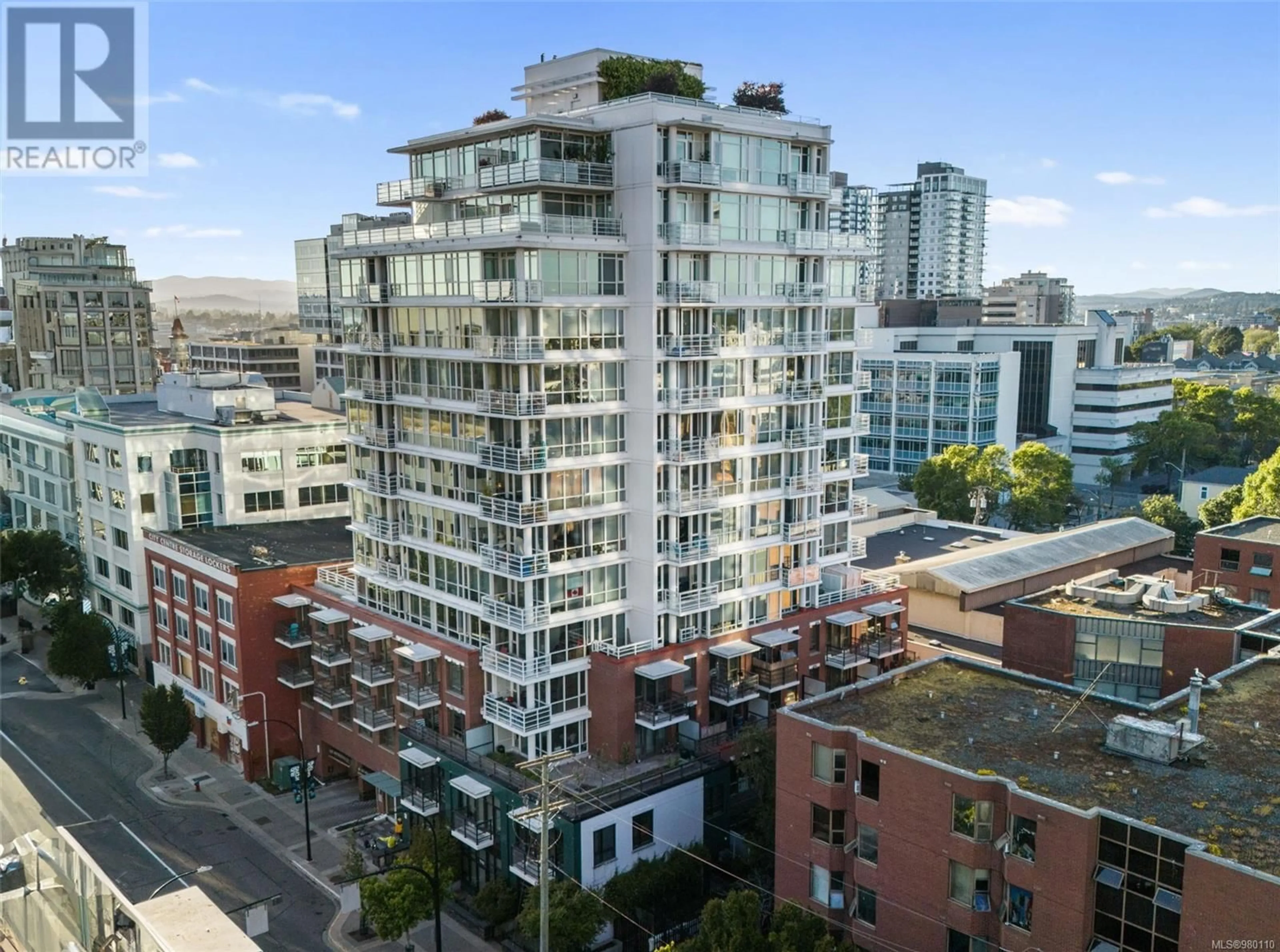 A pic from exterior of the house or condo, the view of city buildings for 308 834 Johnson St, Victoria British Columbia V8W1N3