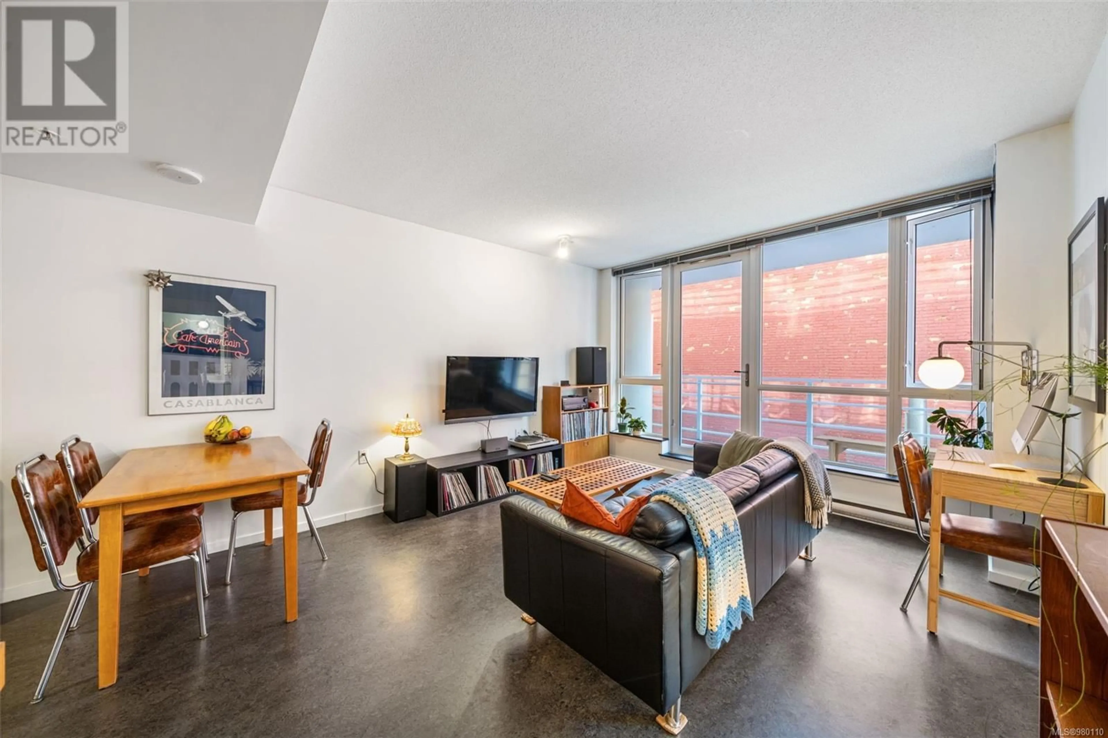 Living room, wood floors for 308 834 Johnson St, Victoria British Columbia V8W1N3