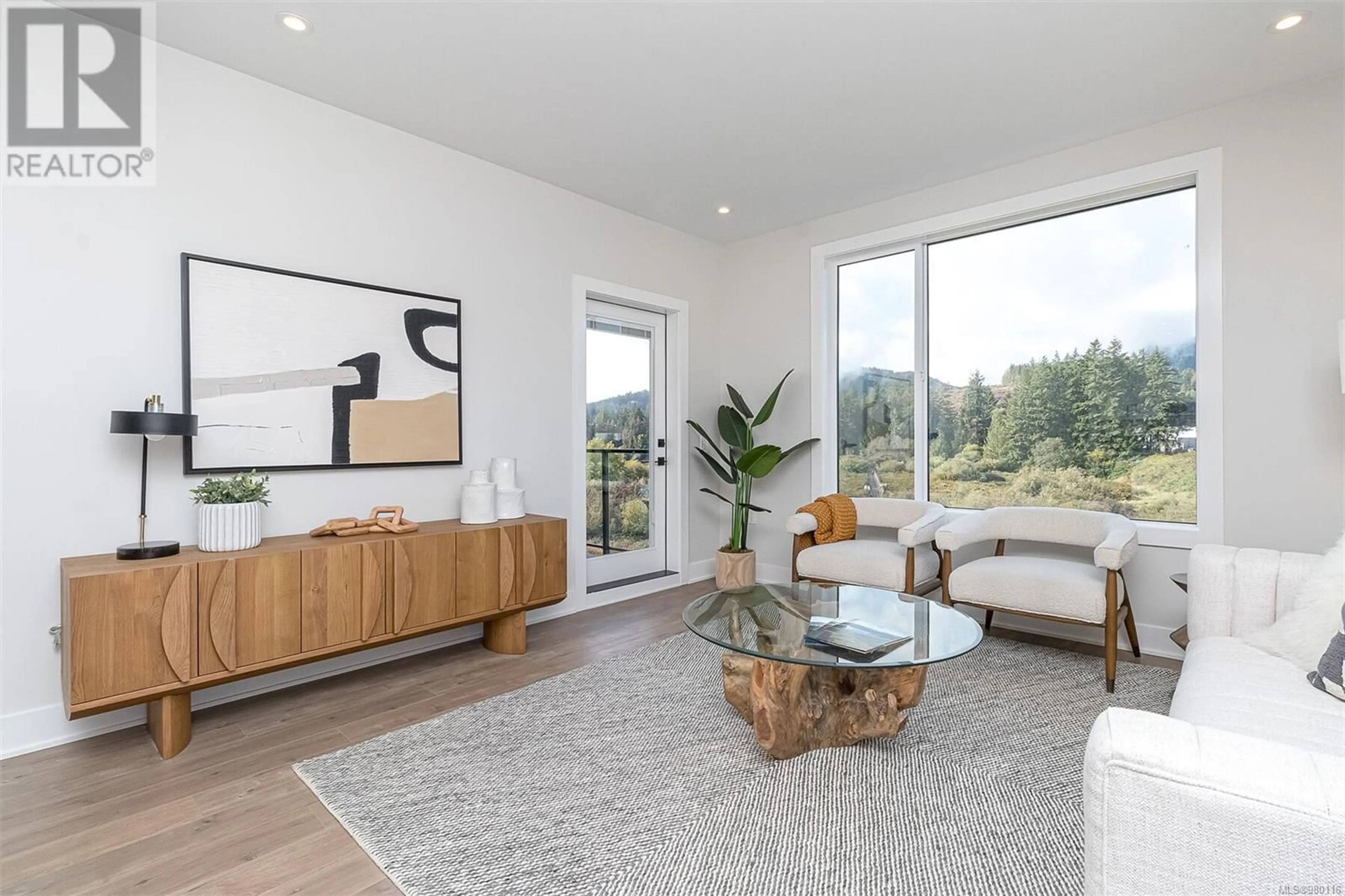 Living room, wood floors for 610 1371 Goldstream Ave, Langford British Columbia V9B7B4