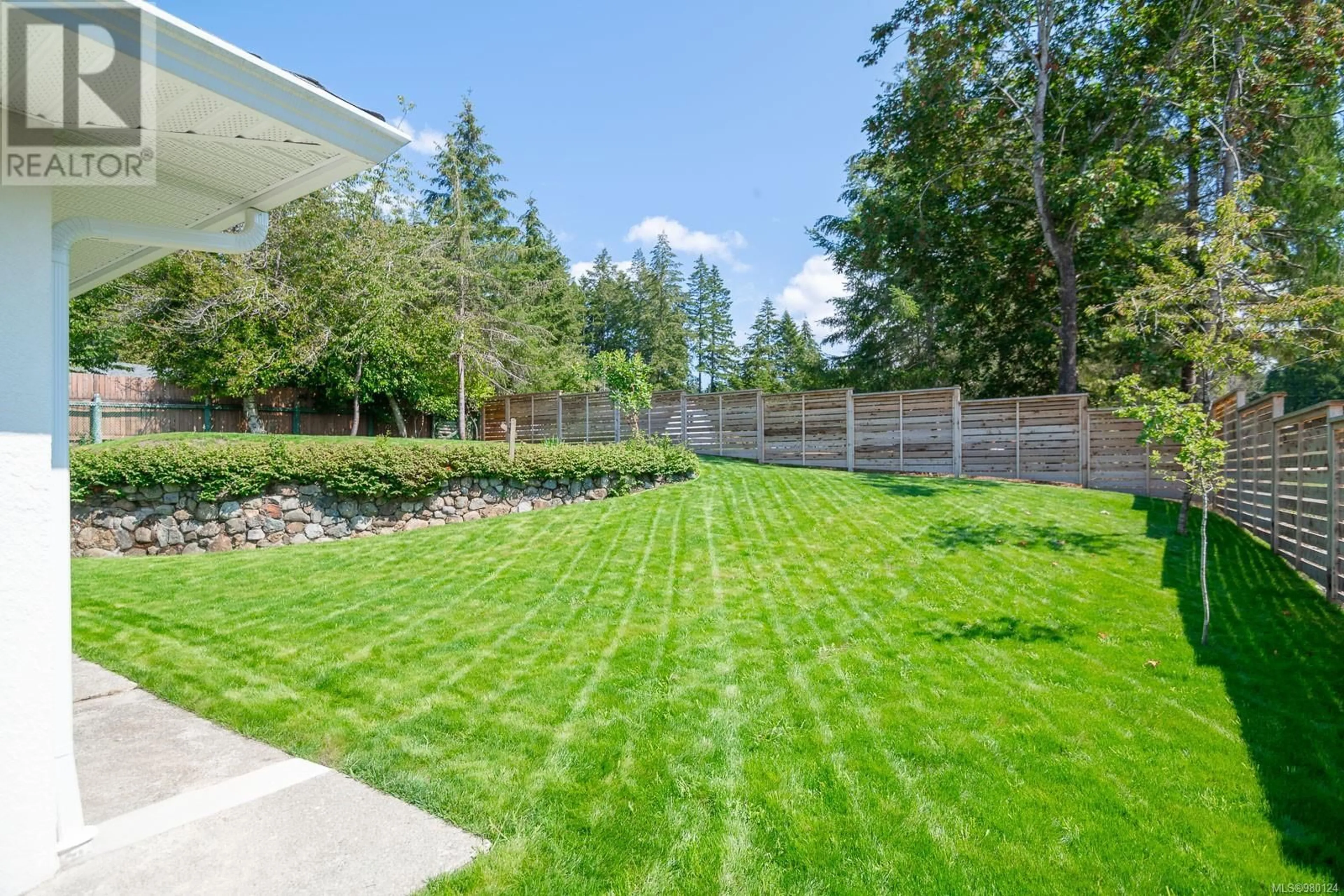 Patio, the fenced backyard for 5843 Strathcona St, Port Alberni British Columbia V9Y8S4