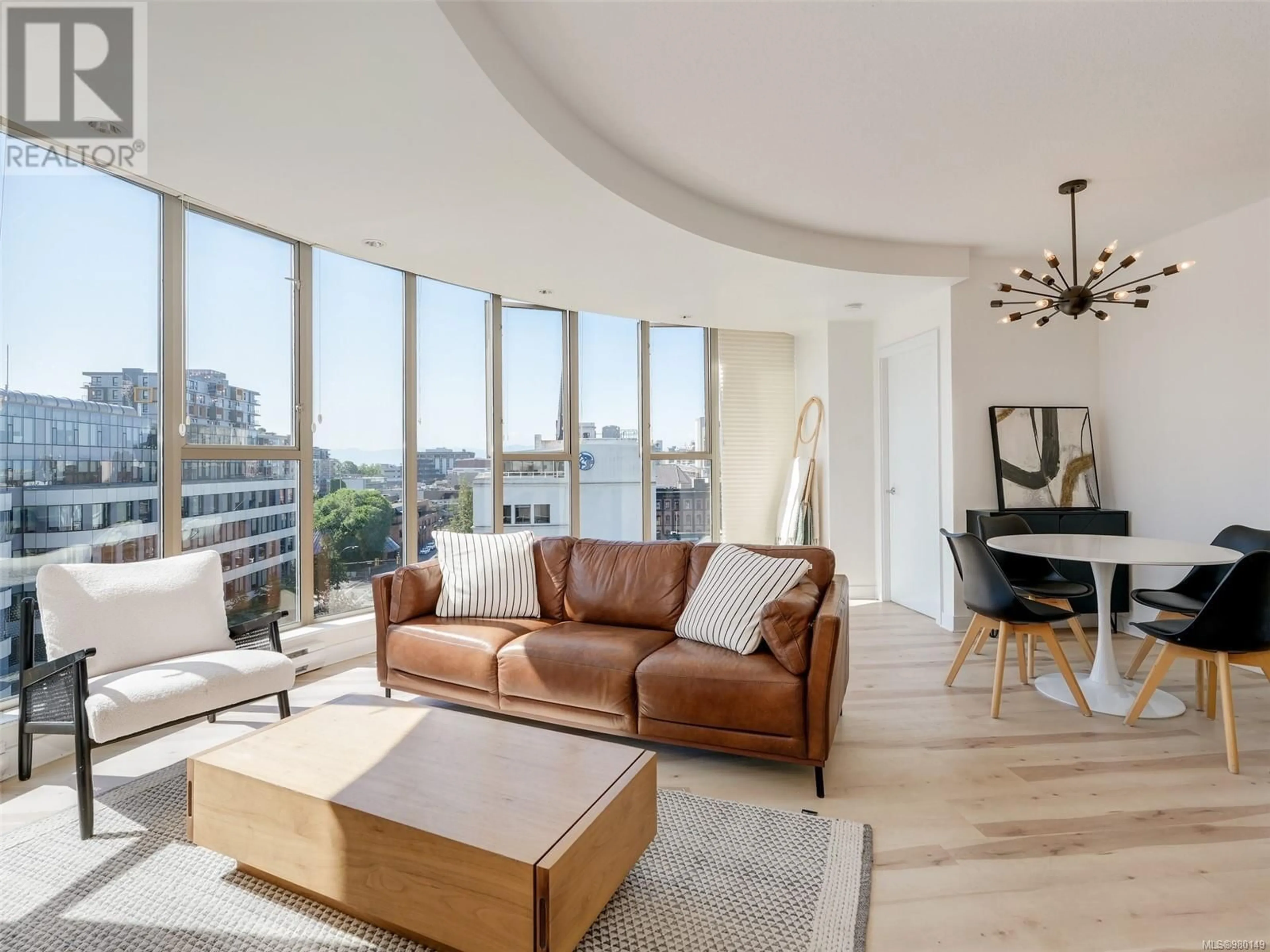 Living room, wood floors for 801 760 Johnson St, Victoria British Columbia V8W1N1