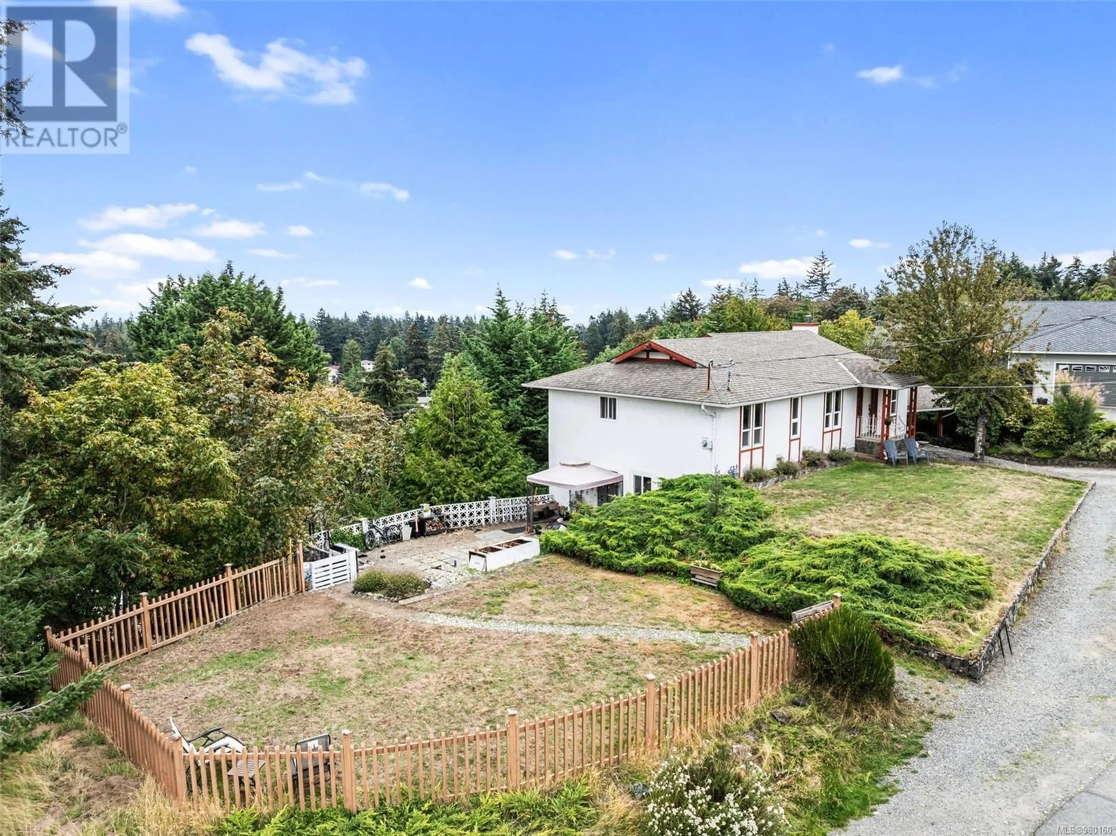 Frontside or backside of a home, the fenced backyard for 3373 Rothnie Pl, Colwood British Columbia V9C3G4