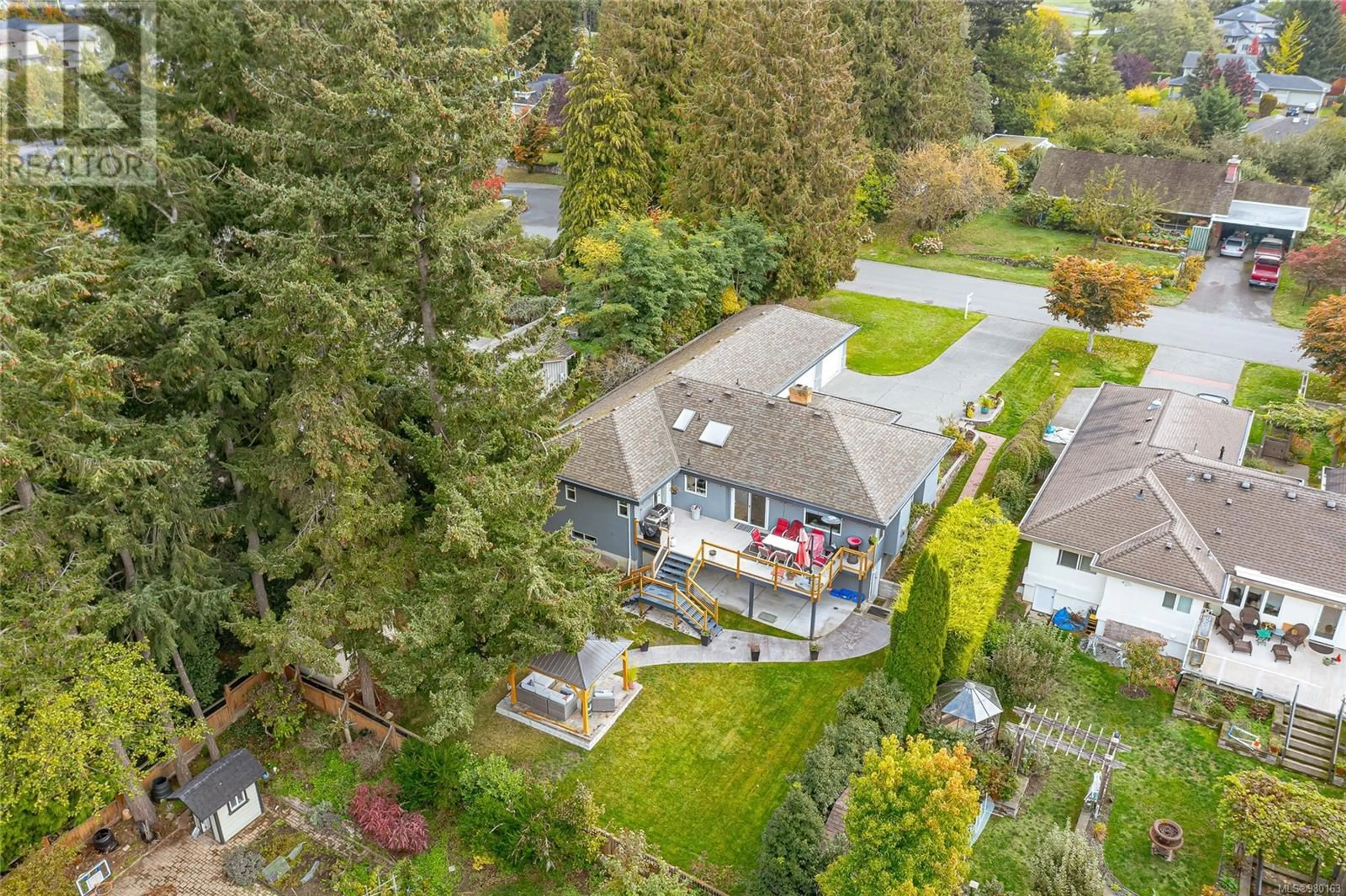 Frontside or backside of a home, the fenced backyard for 4962 HIGHGATE Rd, Saanich British Columbia V8Y1V9