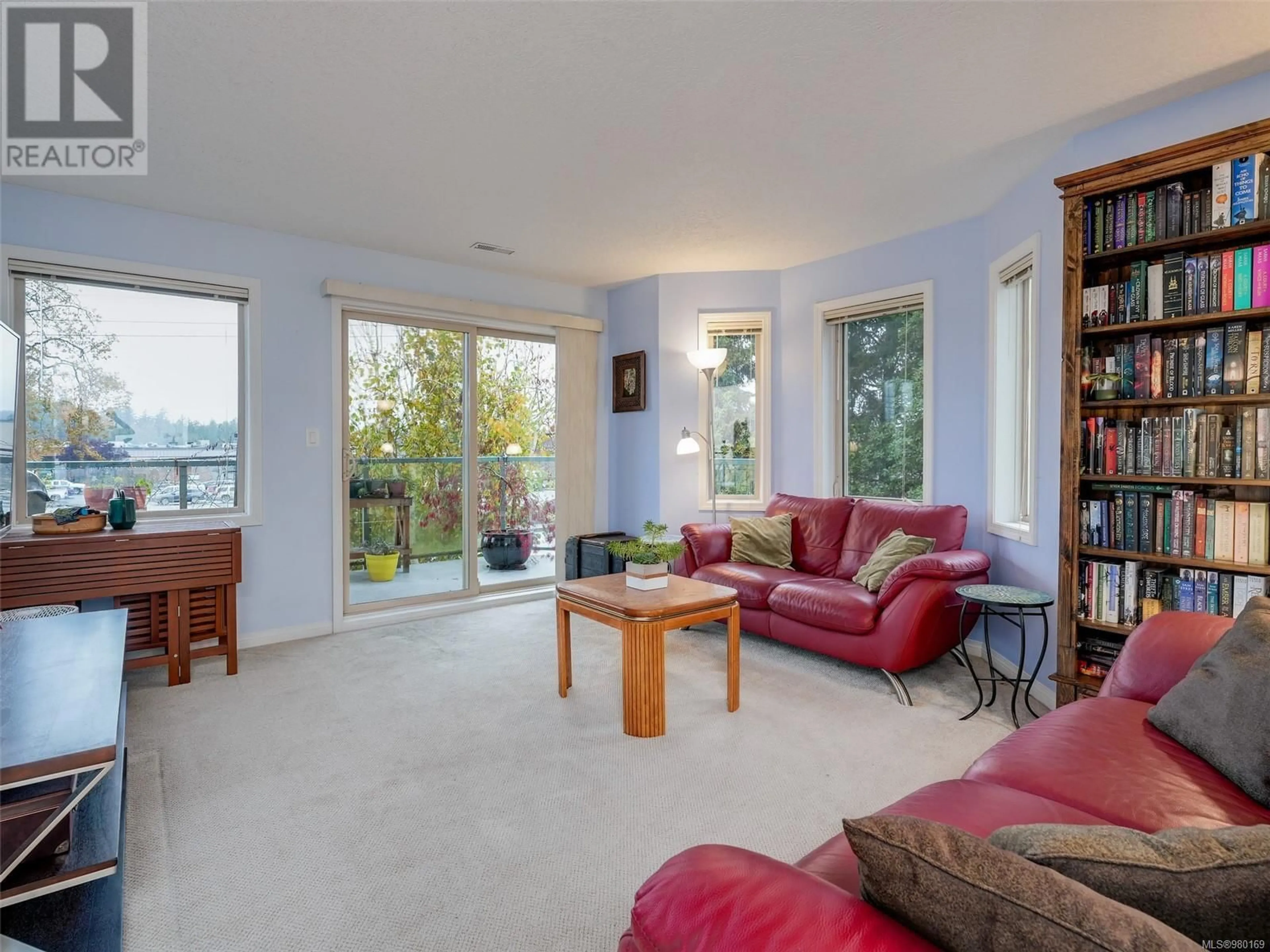 Living room, wood floors for 301 3157 Tillicum Rd, Saanich British Columbia V9A2B4