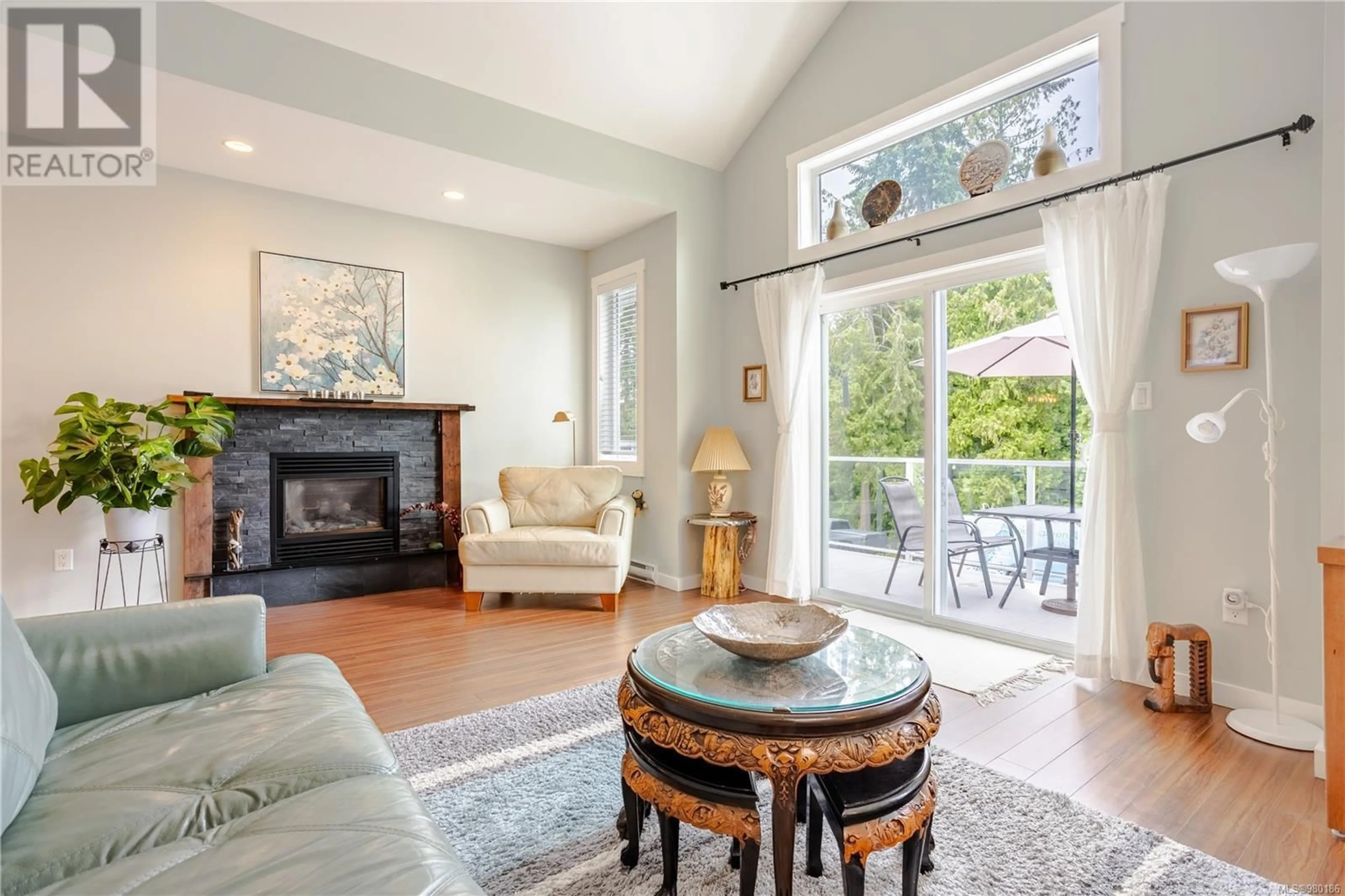 Living room, wood floors for 5727 Bradbury Rd, Nanaimo British Columbia V9T0B6