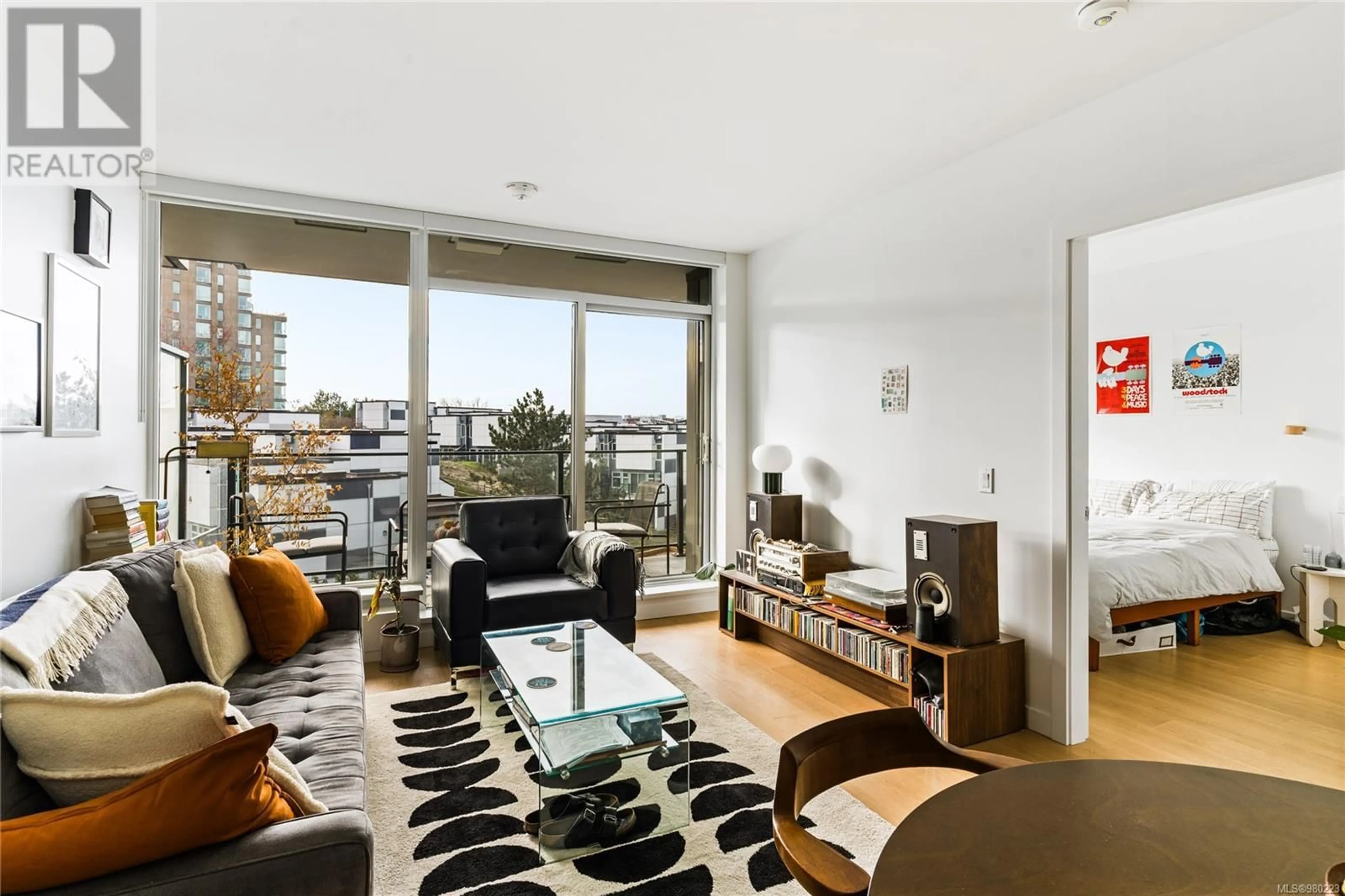 Living room, wood floors for 507 369 Tyee Rd, Victoria British Columbia V9A0B6