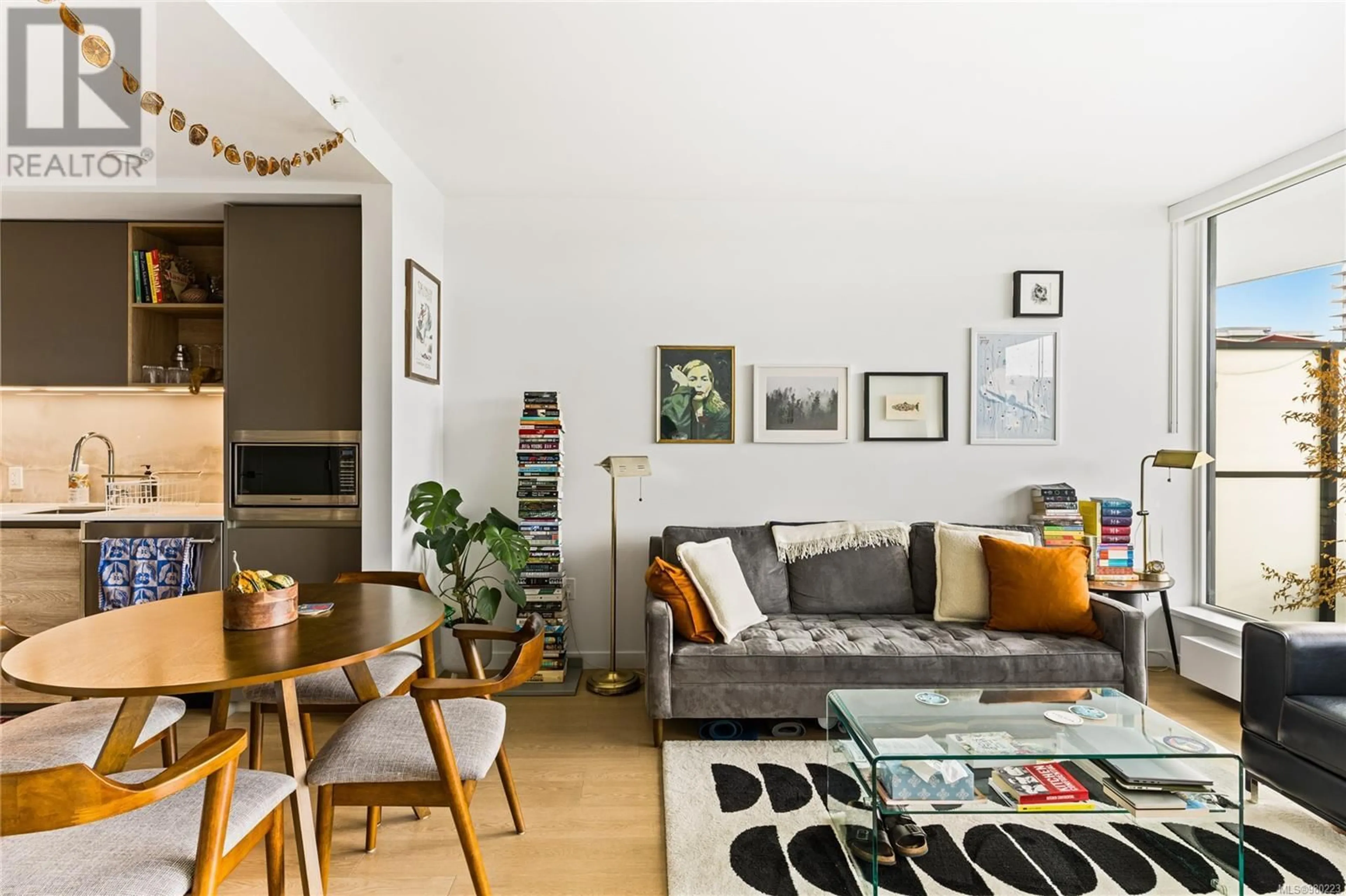 Living room, wood floors for 507 369 Tyee Rd, Victoria British Columbia V9A0B6