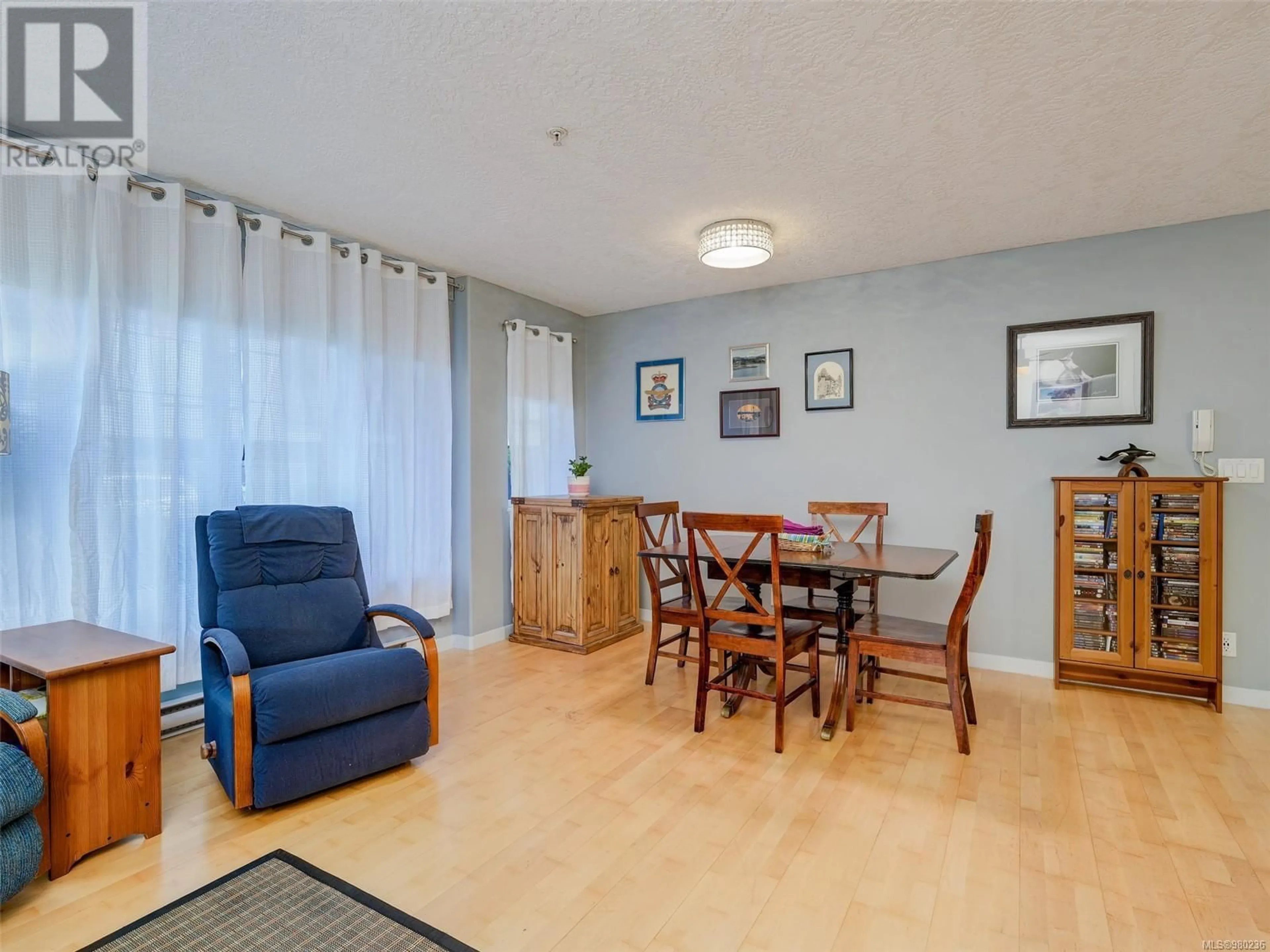 A pic of a room, wood floors for 102 2844 Bryn Maur Rd, Langford British Columbia V9B3T4