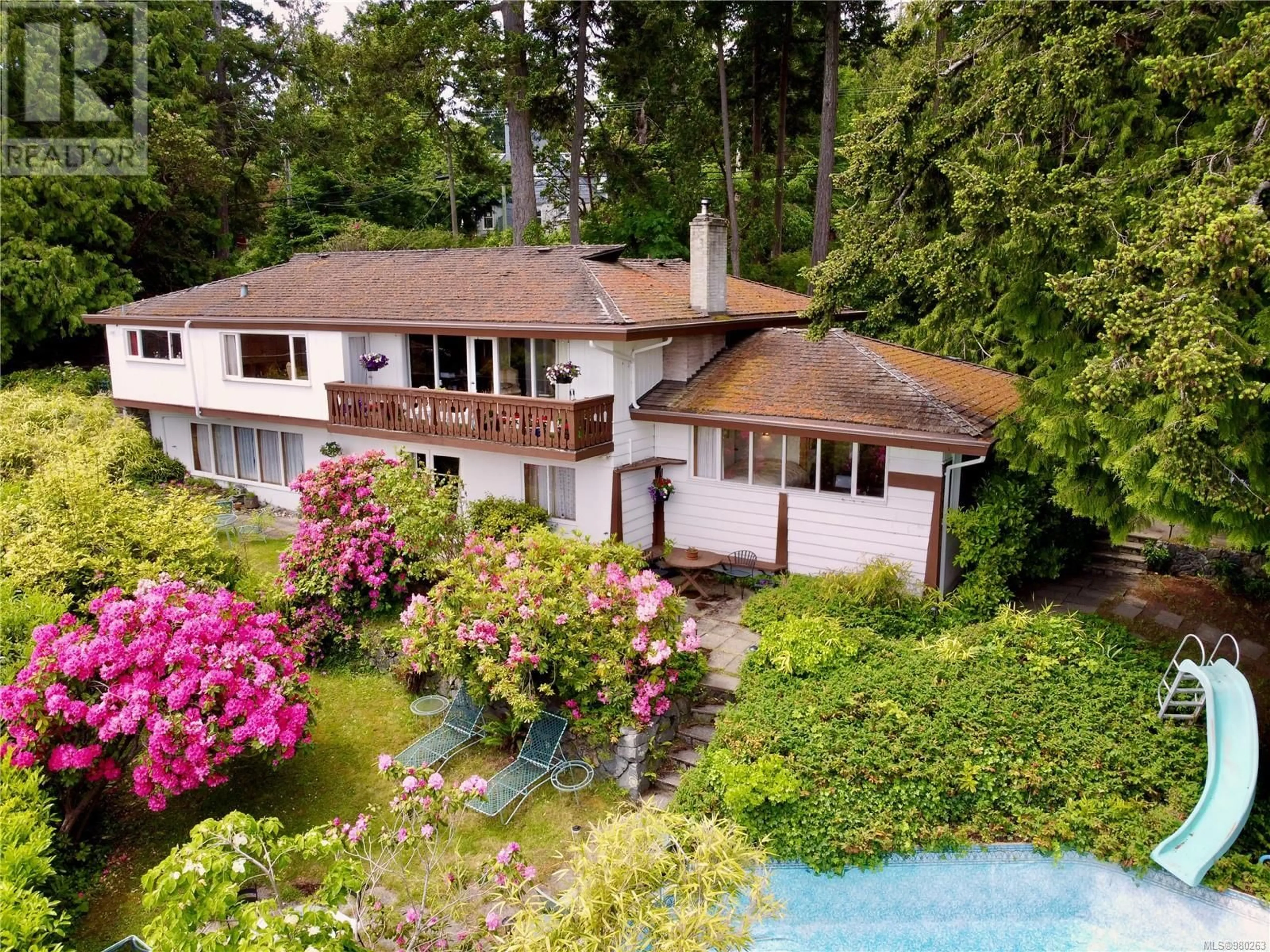 Frontside or backside of a home, cottage for 2320 Arbutus Rd, Saanich British Columbia V8N1V3