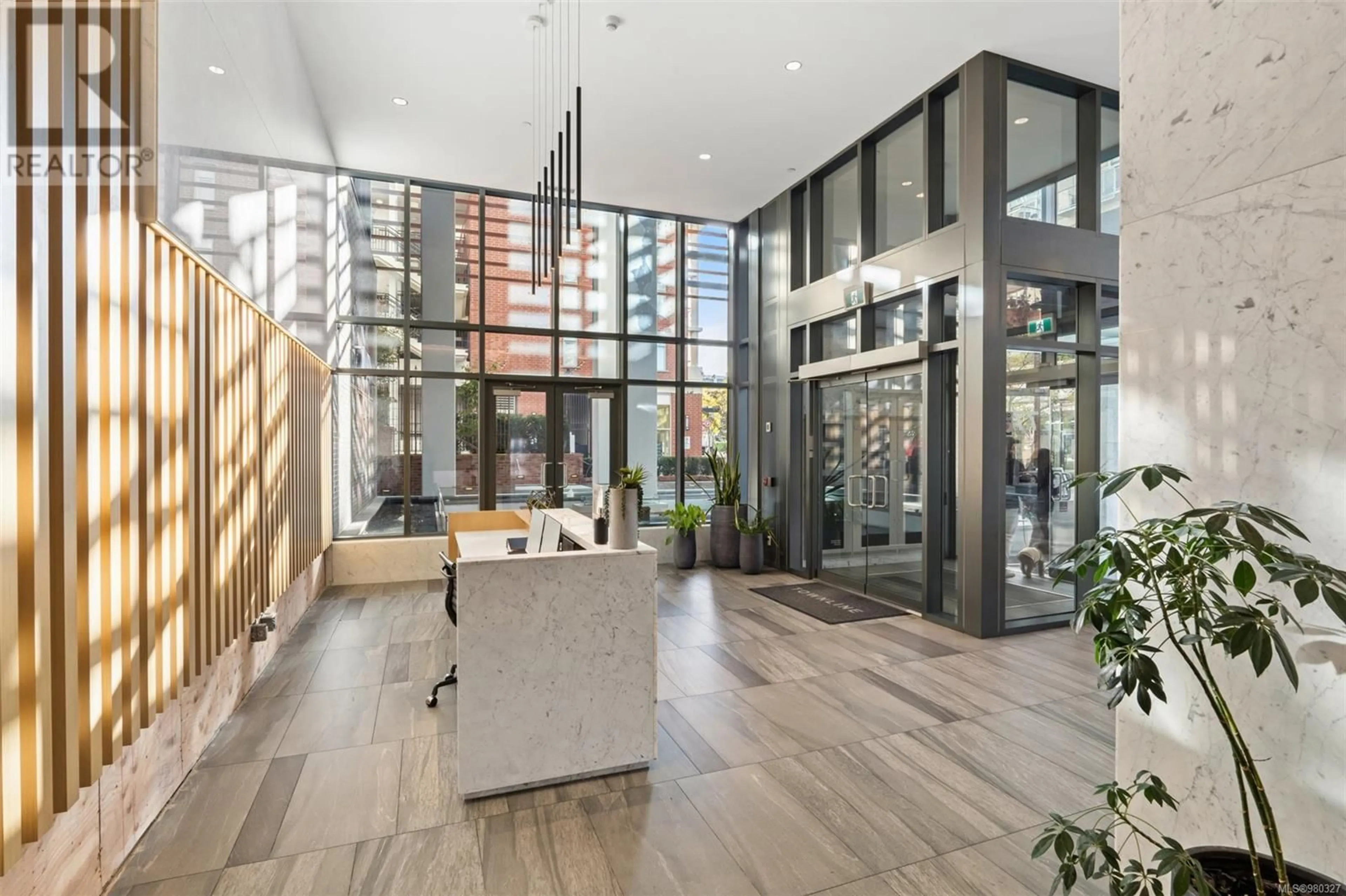 Indoor lobby, wood floors for 909 777 Herald St, Victoria British Columbia V8W1S5