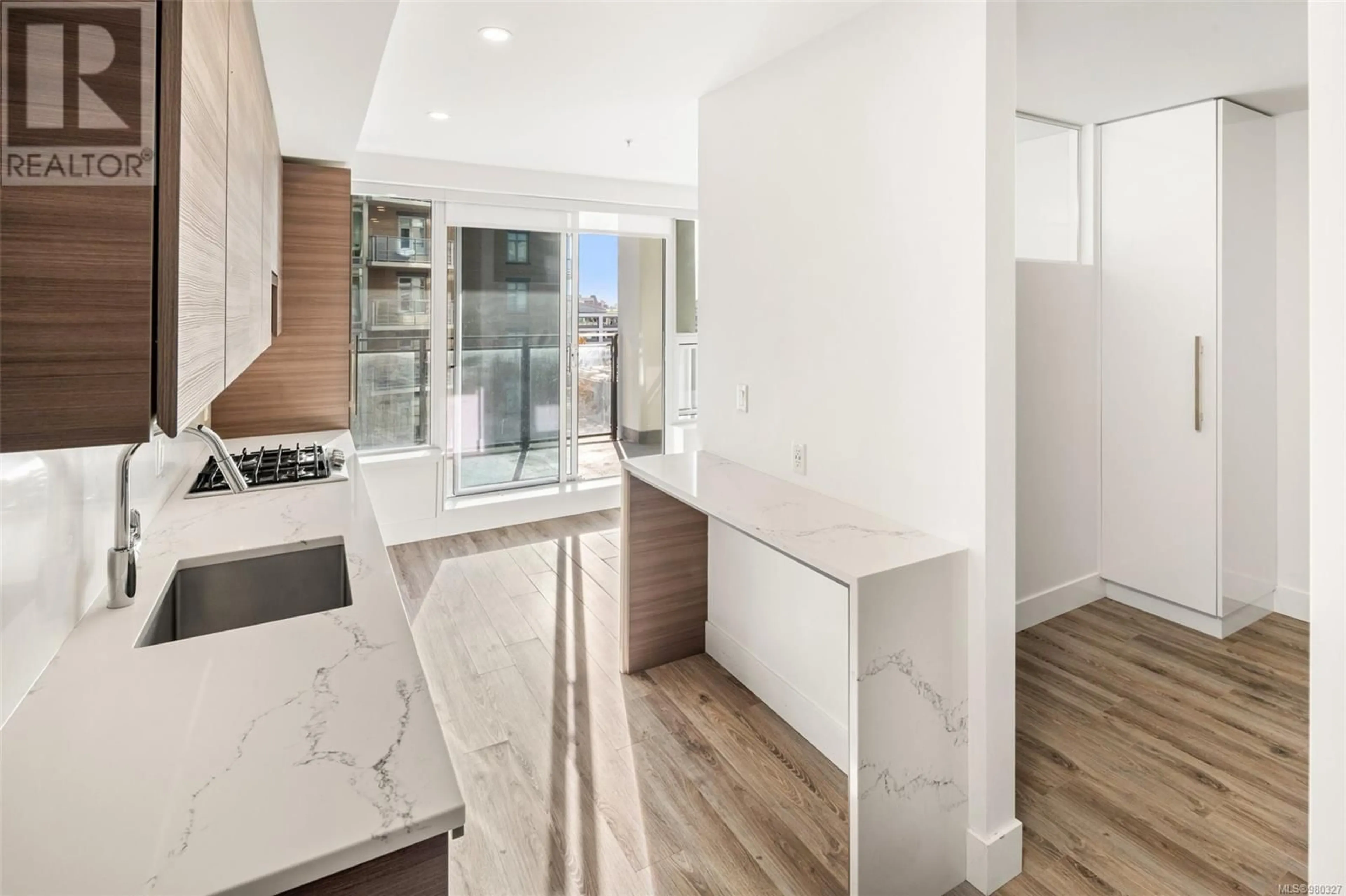 Contemporary kitchen, wood floors for 909 777 Herald St, Victoria British Columbia V8W1S5