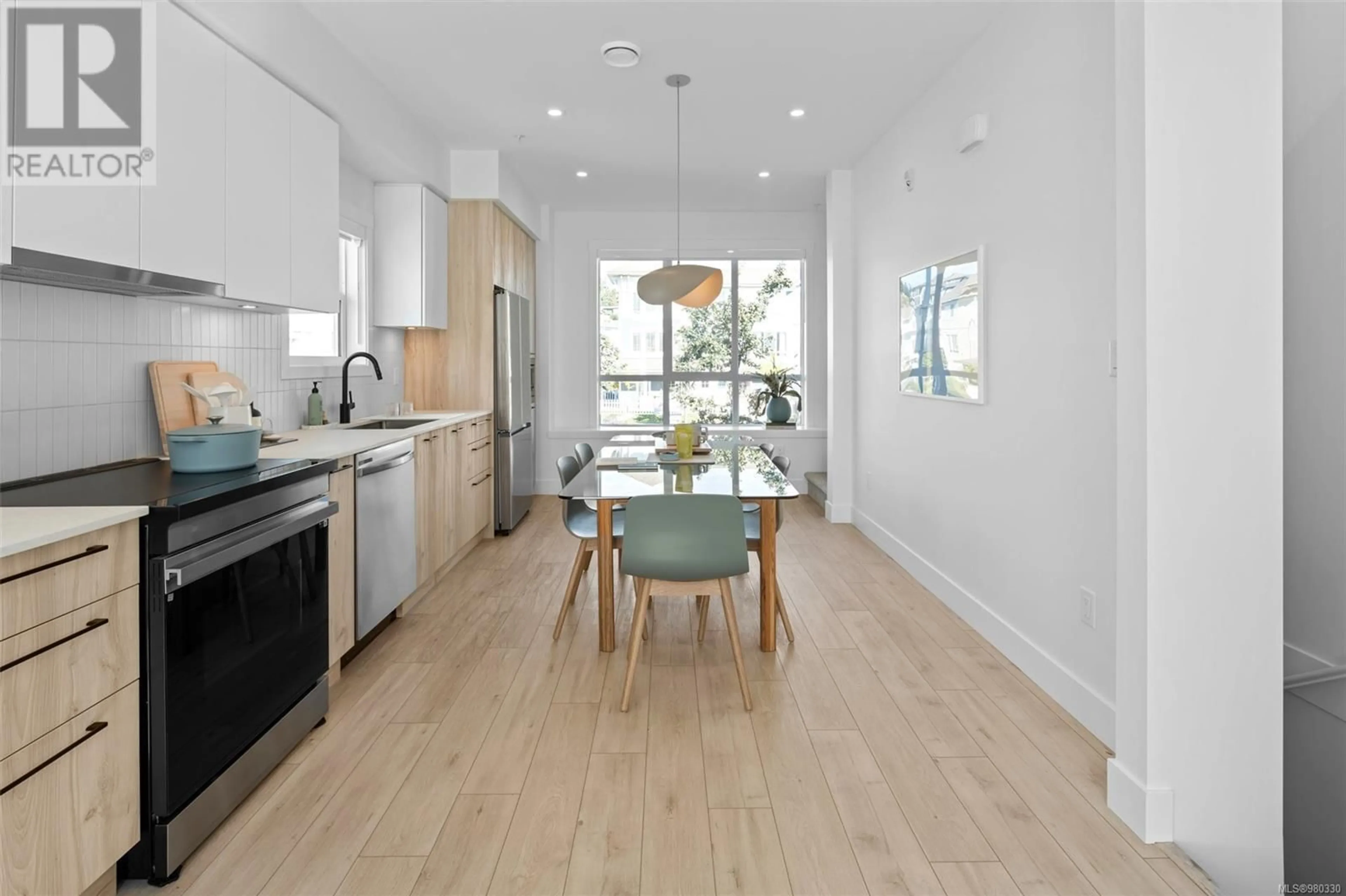 Open concept kitchen, wood/laminate floor for 59 - 368 TRADEWINDS AVENUE, Colwood British Columbia V9C0R9