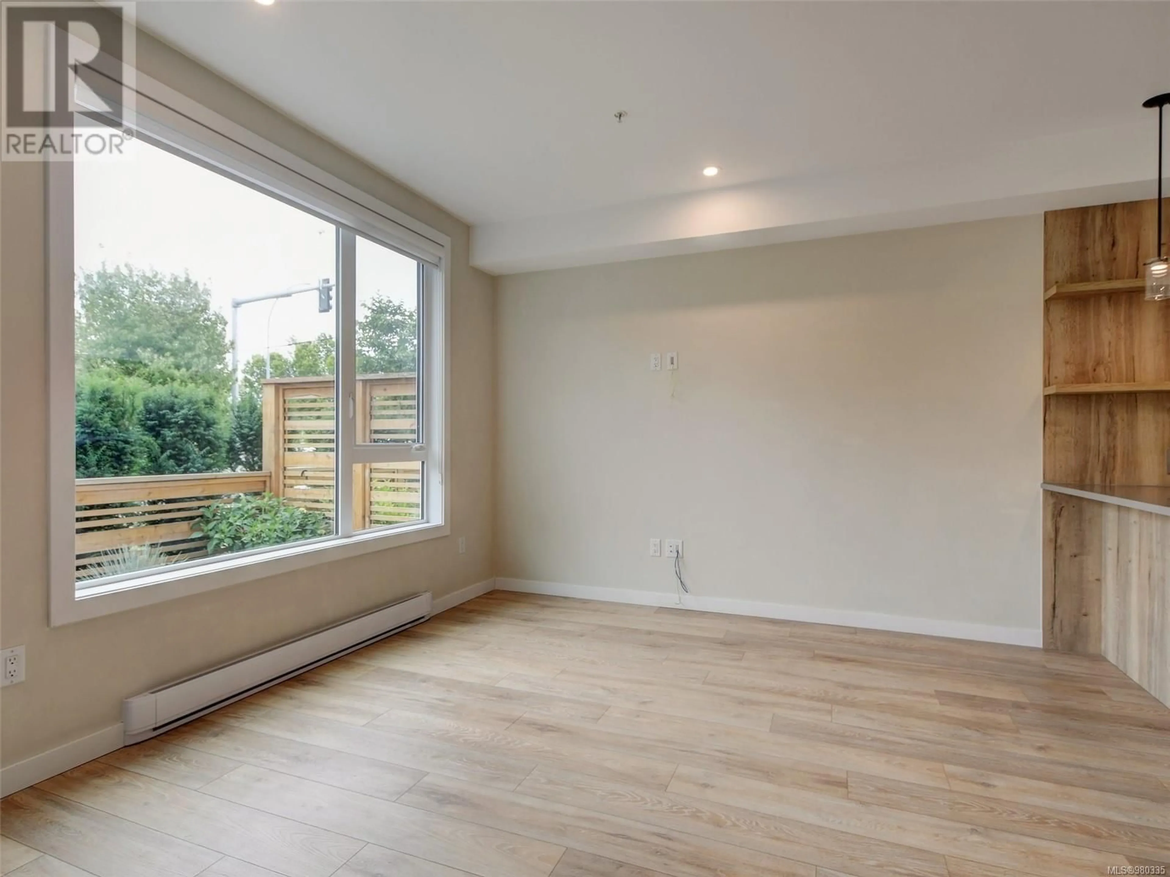 A pic of a room, wood floors for 101 1588 North Dairy Rd, Saanich British Columbia V8T0E1