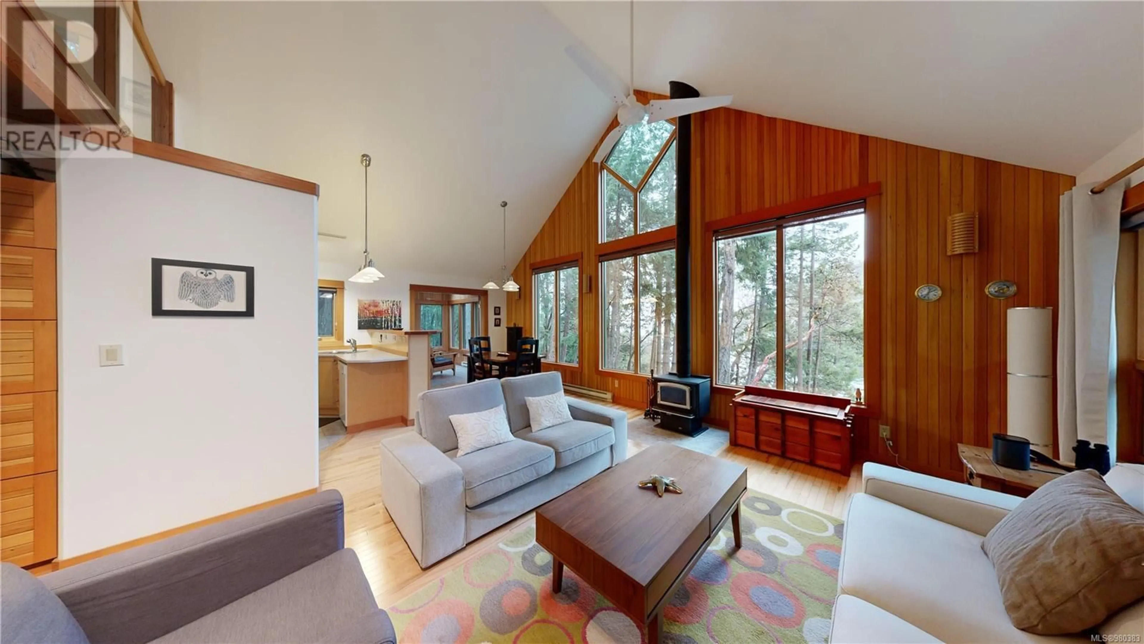 Living room, wood floors for 211 Halibut Hill, Mudge Island British Columbia V0R1X6