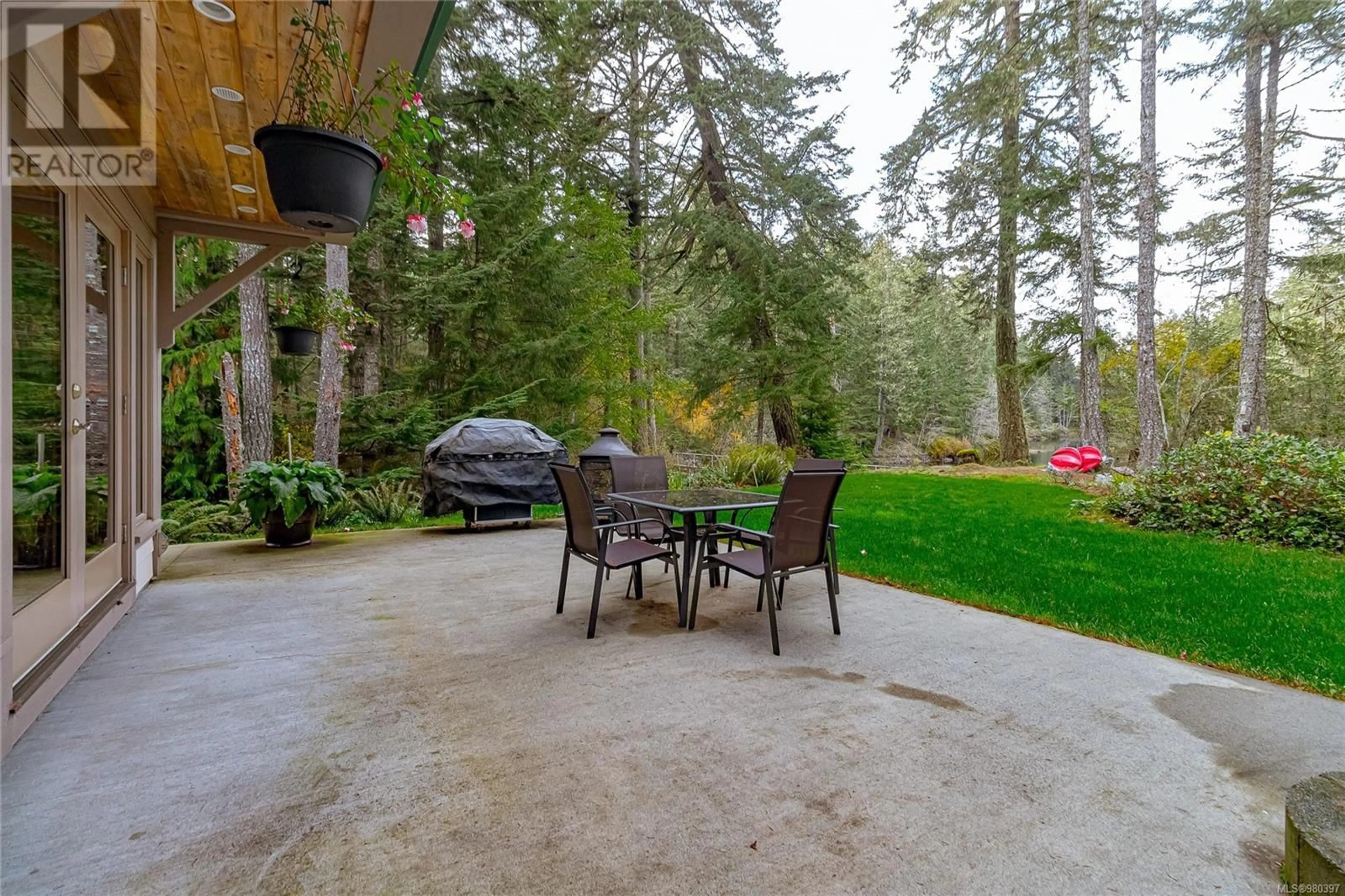 Patio, the fenced backyard for 4928 Mt. Matheson Rd, Sooke British Columbia V9Z1C6