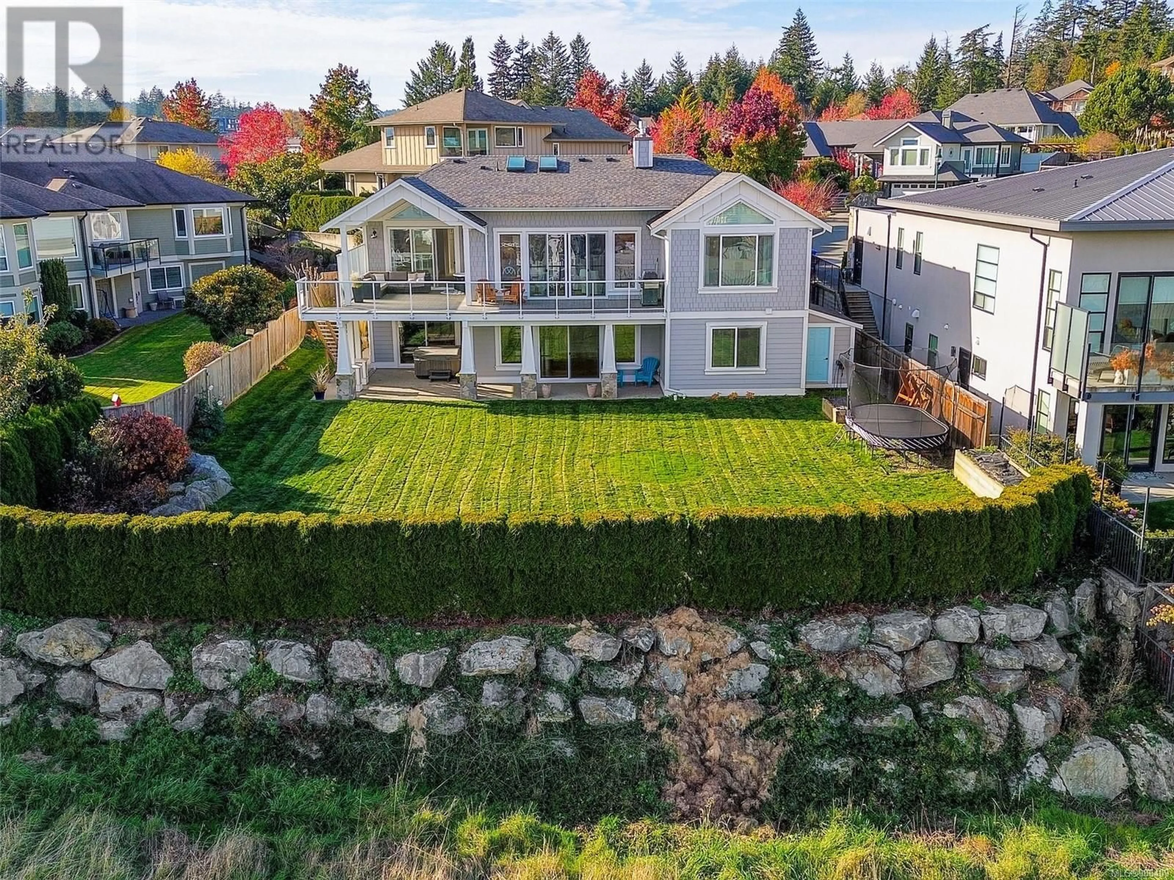 Frontside or backside of a home, the fenced backyard for 3533 Proudfoot Pl, Colwood British Columbia V9C4L9