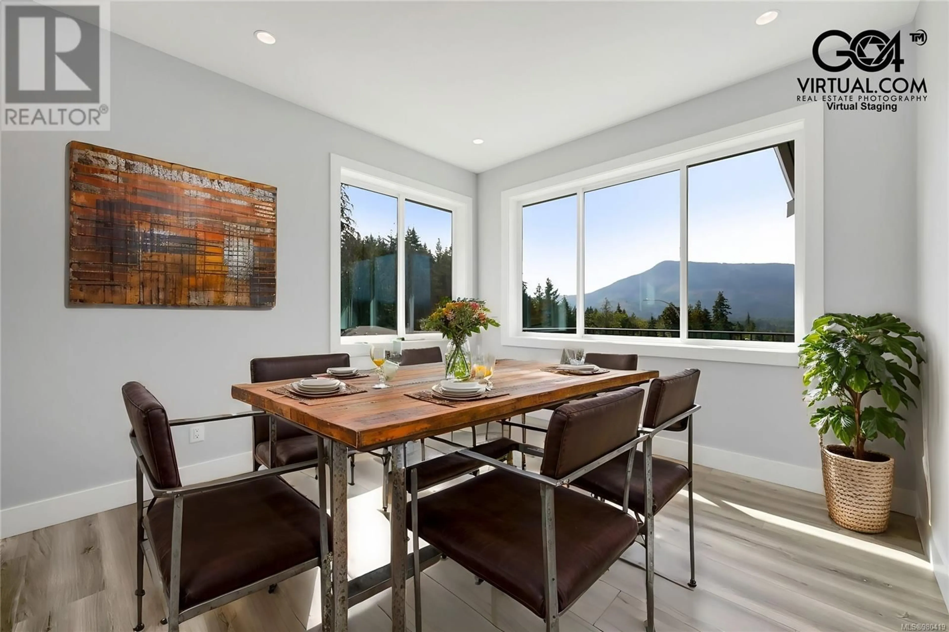 Dining room, wood floors, mountain for 708 Mountain View Dr N, Lake Cowichan British Columbia V0R2G0