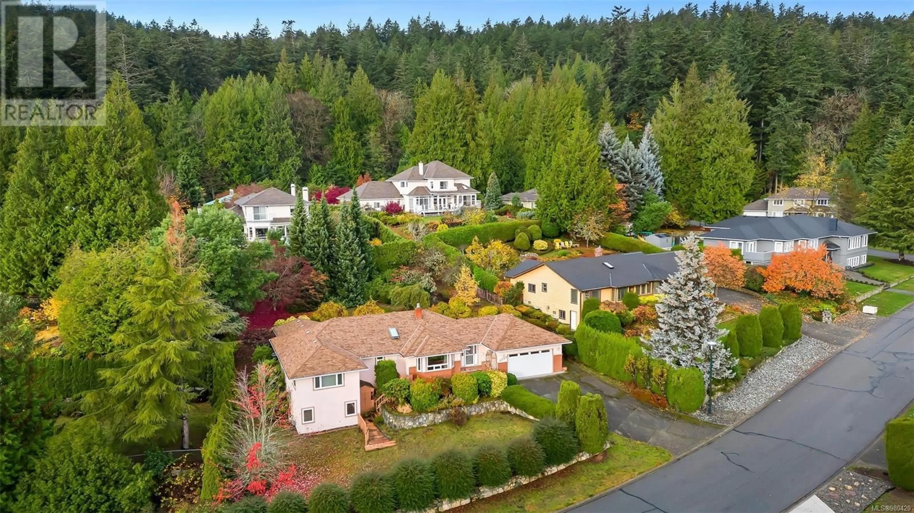 Frontside or backside of a home, the fenced backyard for 8594 Kingcome Cres, North Saanich British Columbia V8L5C7