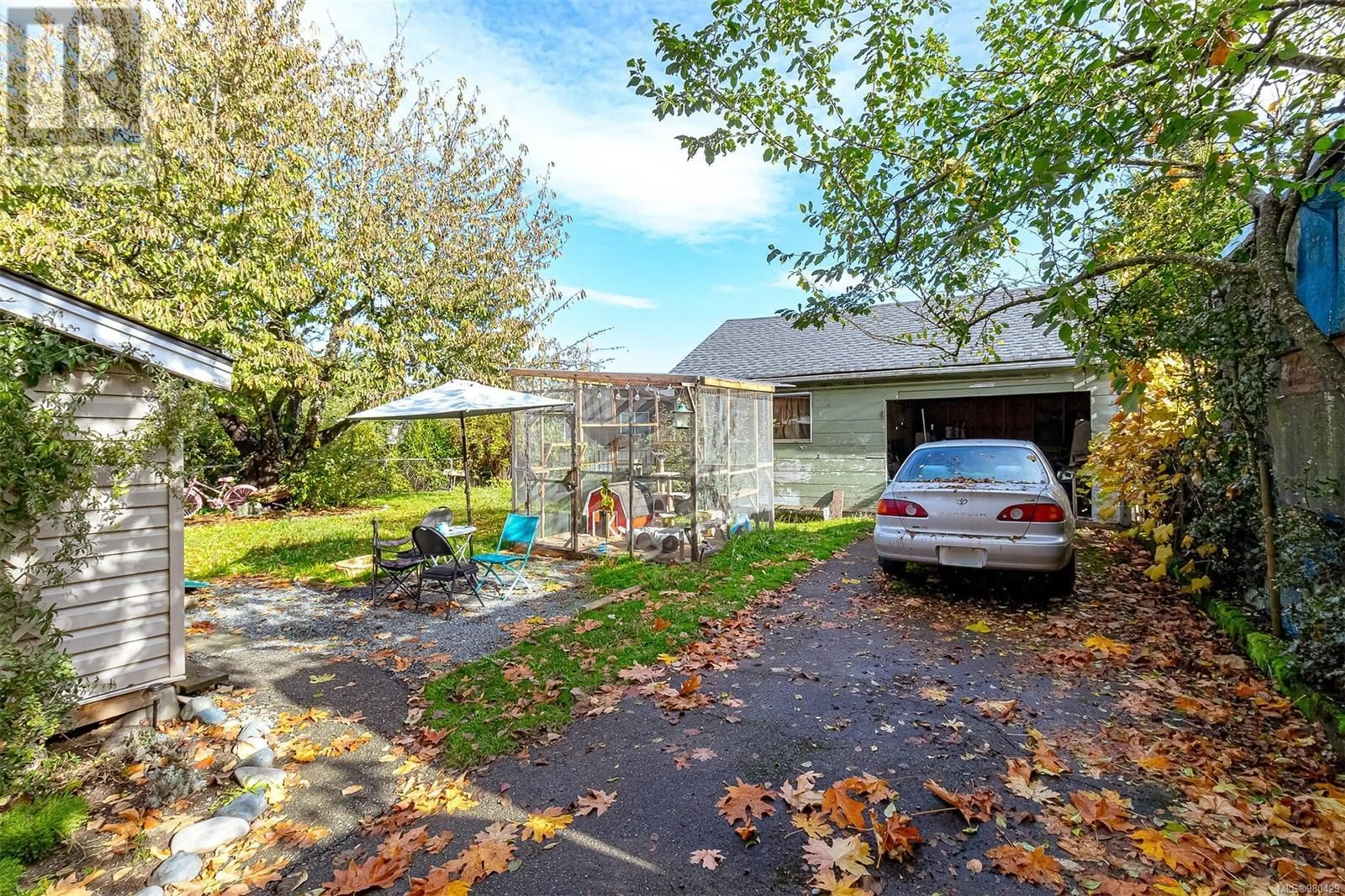 A pic from exterior of the house or condo, the fenced backyard for 446 Festubert St, Duncan British Columbia V9L3T2