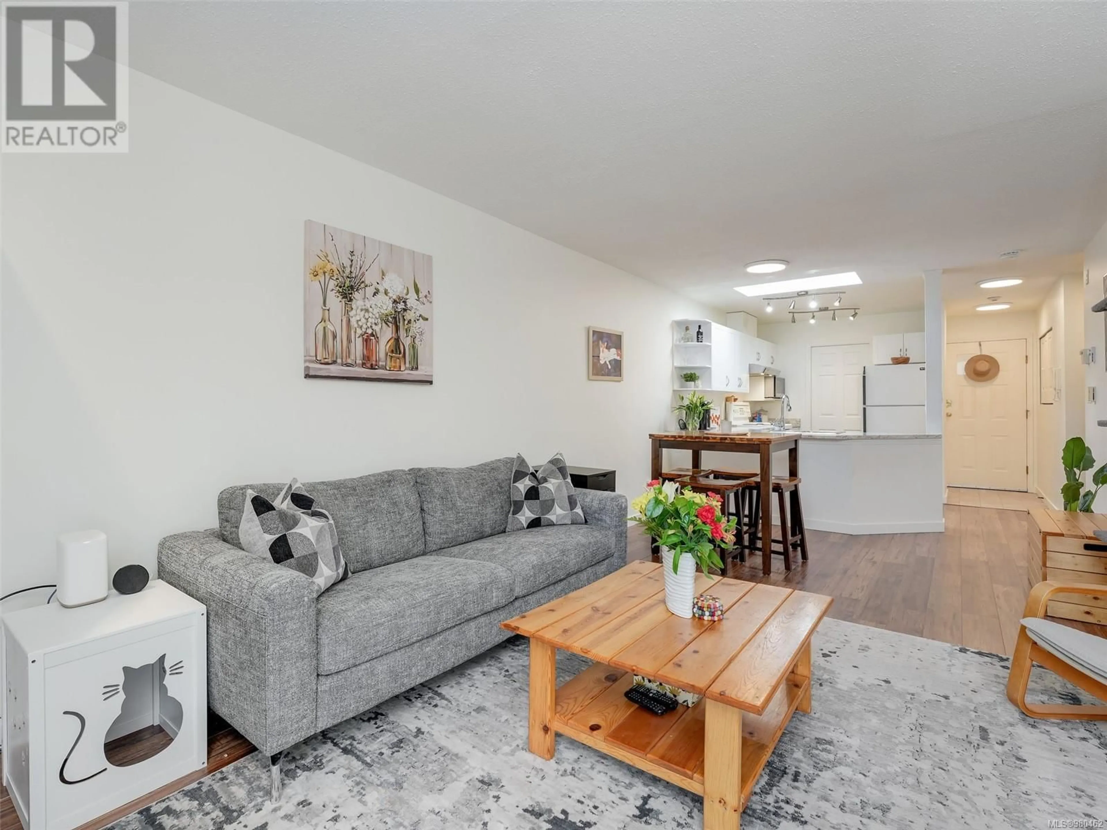 Living room, wood floors for 306 1032 Inverness Rd, Saanich British Columbia V8N1J7