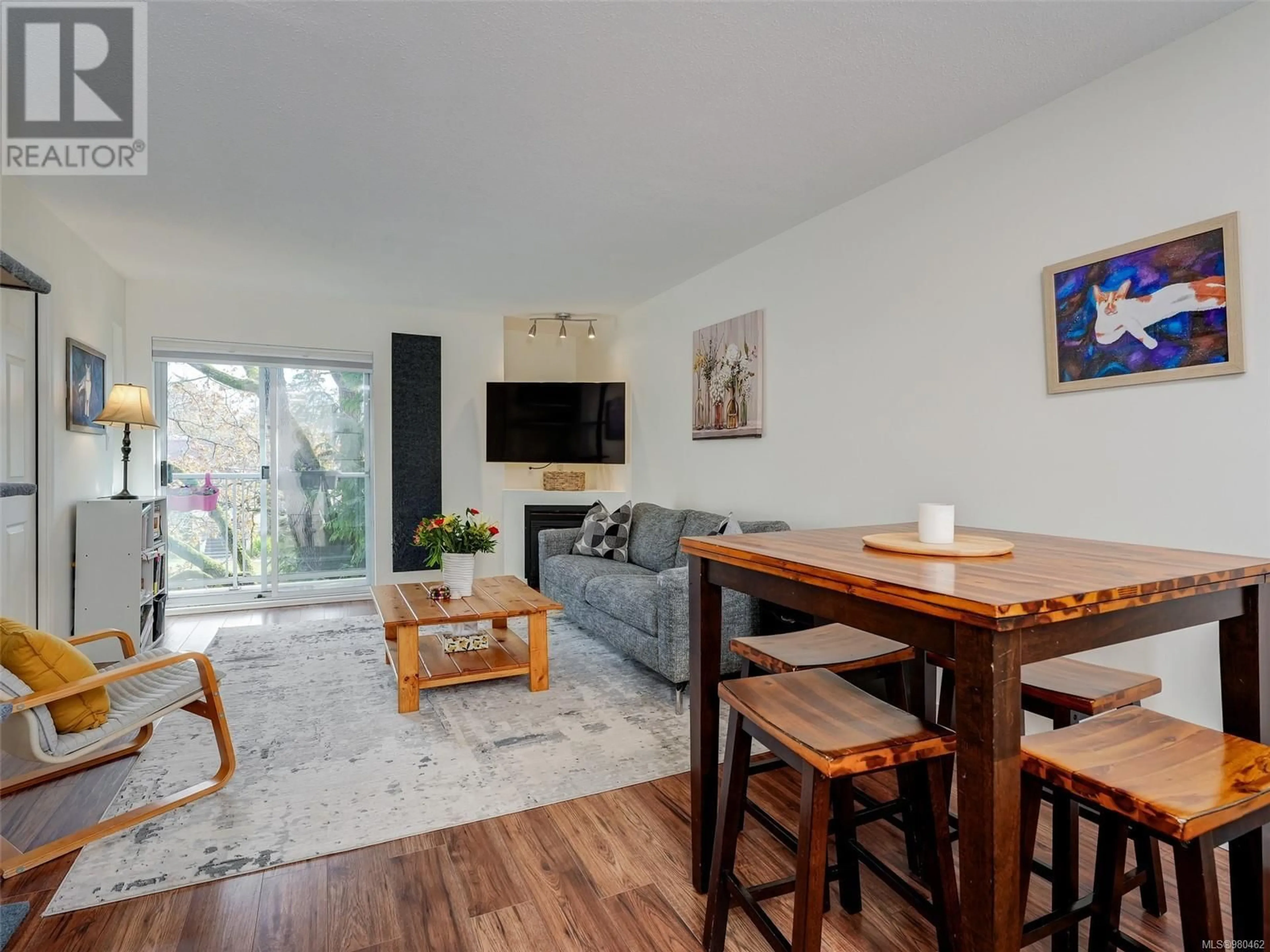 Living room, wood floors for 306 1032 Inverness Rd, Saanich British Columbia V8N1J7