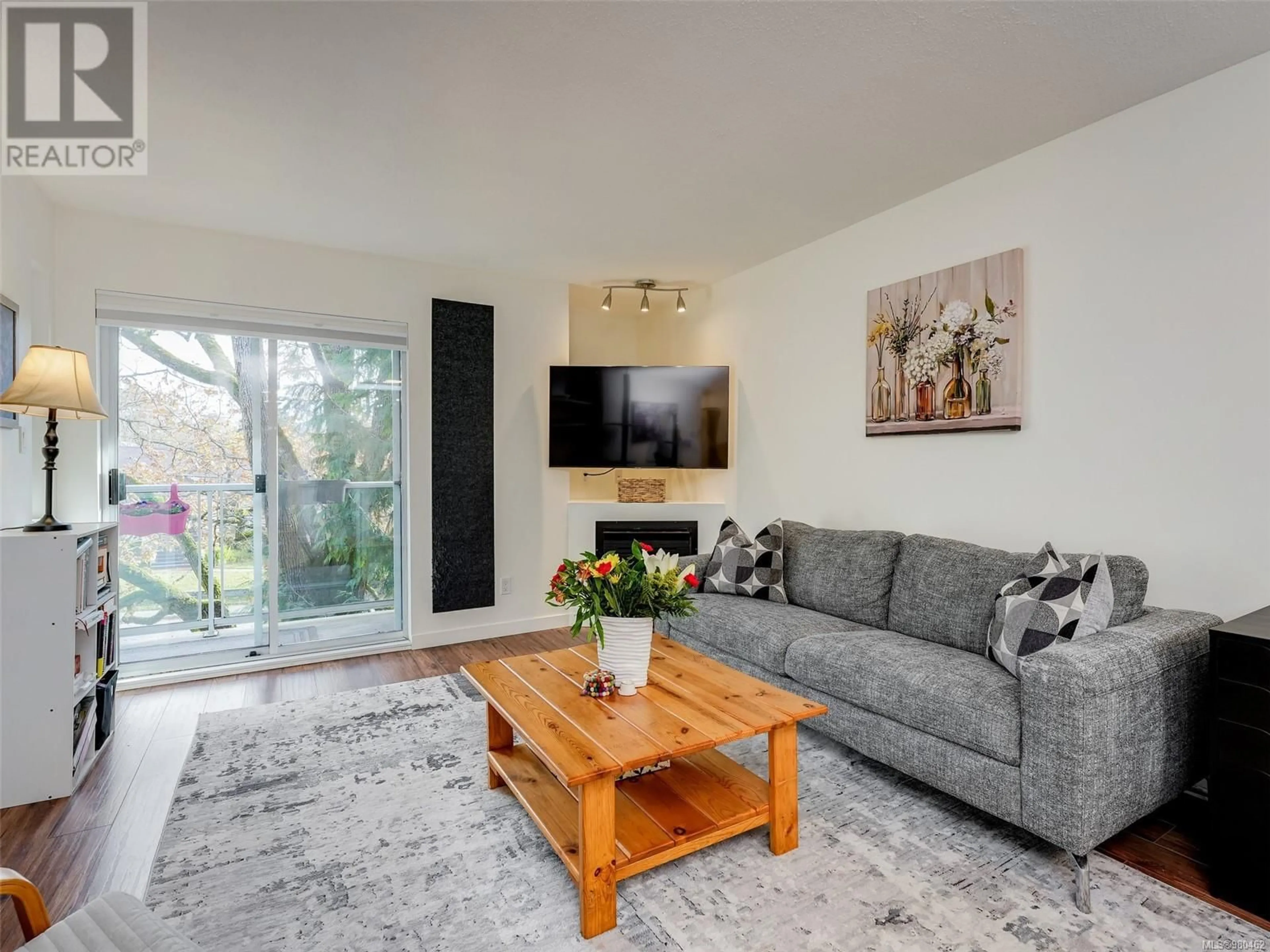 Living room, wood floors for 306 1032 Inverness Rd, Saanich British Columbia V8N1J7