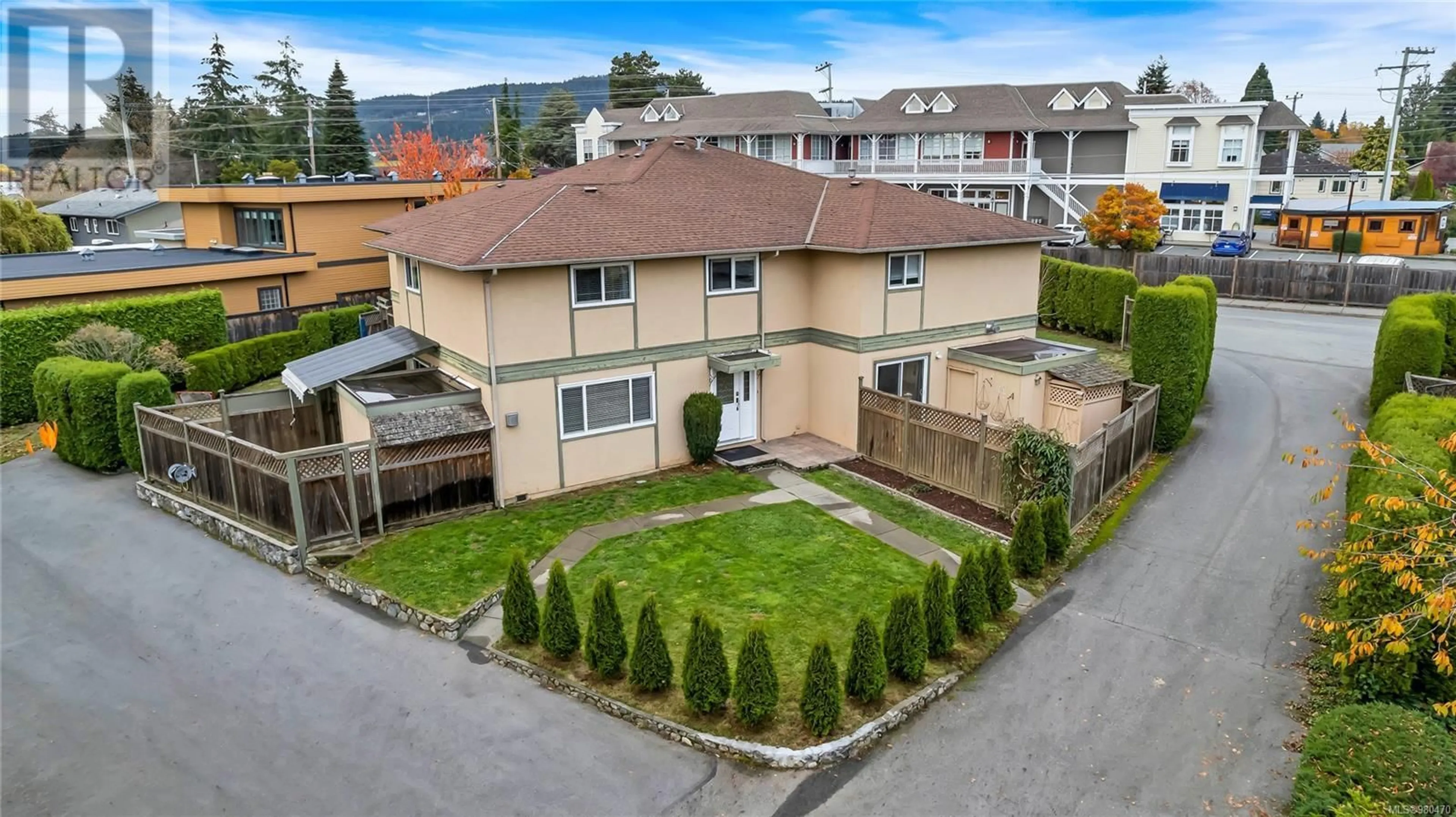 Frontside or backside of a home, the fenced backyard for 4 1945 Lisnoe Ave, Central Saanich British Columbia V8M1T2