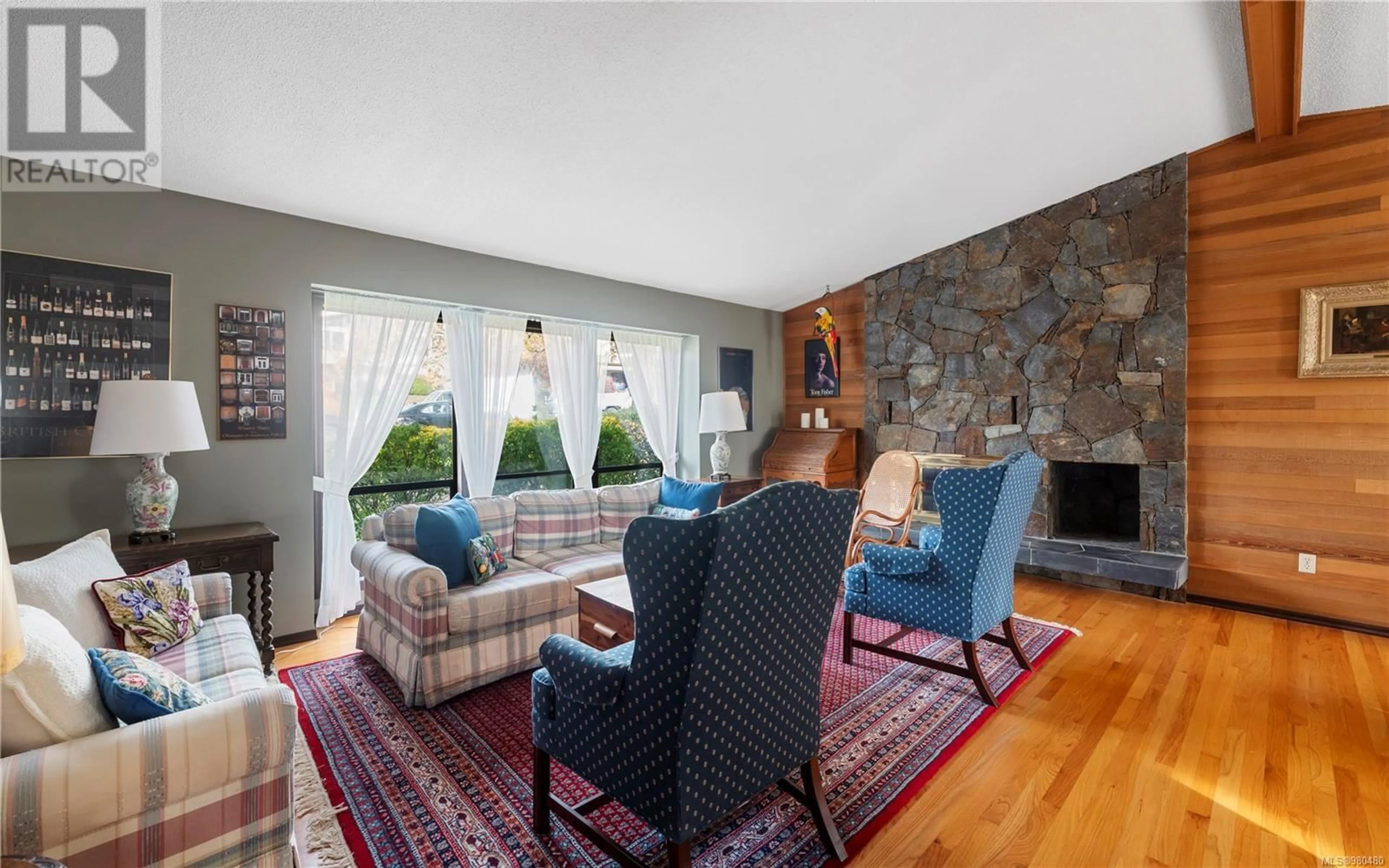 Living room, wood floors for 887 Denford Cres, Saanich British Columbia V8X4M9