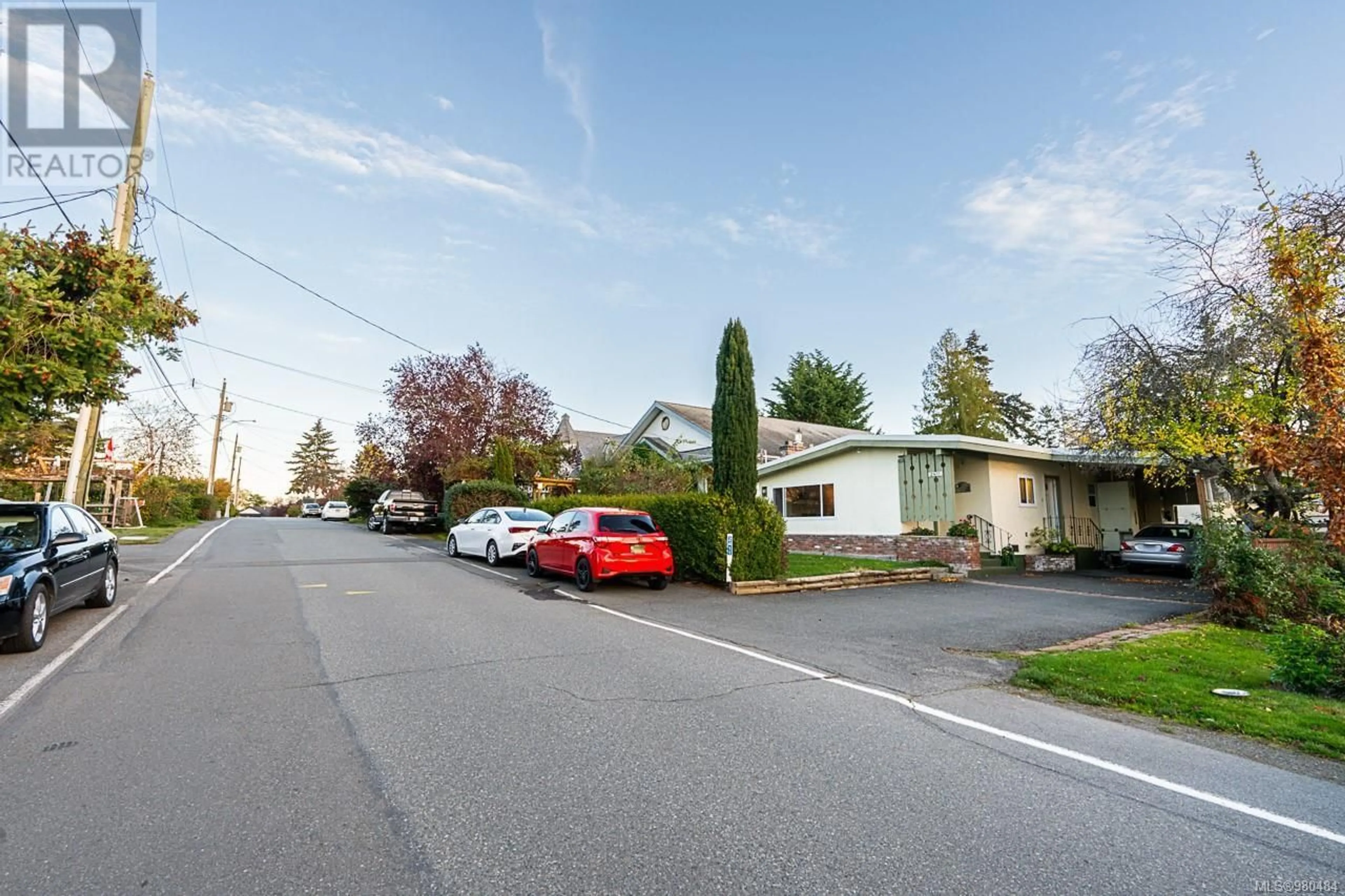 Frontside or backside of a home, the street view for 2411 Amelia Ave, Sidney British Columbia V8L2J4