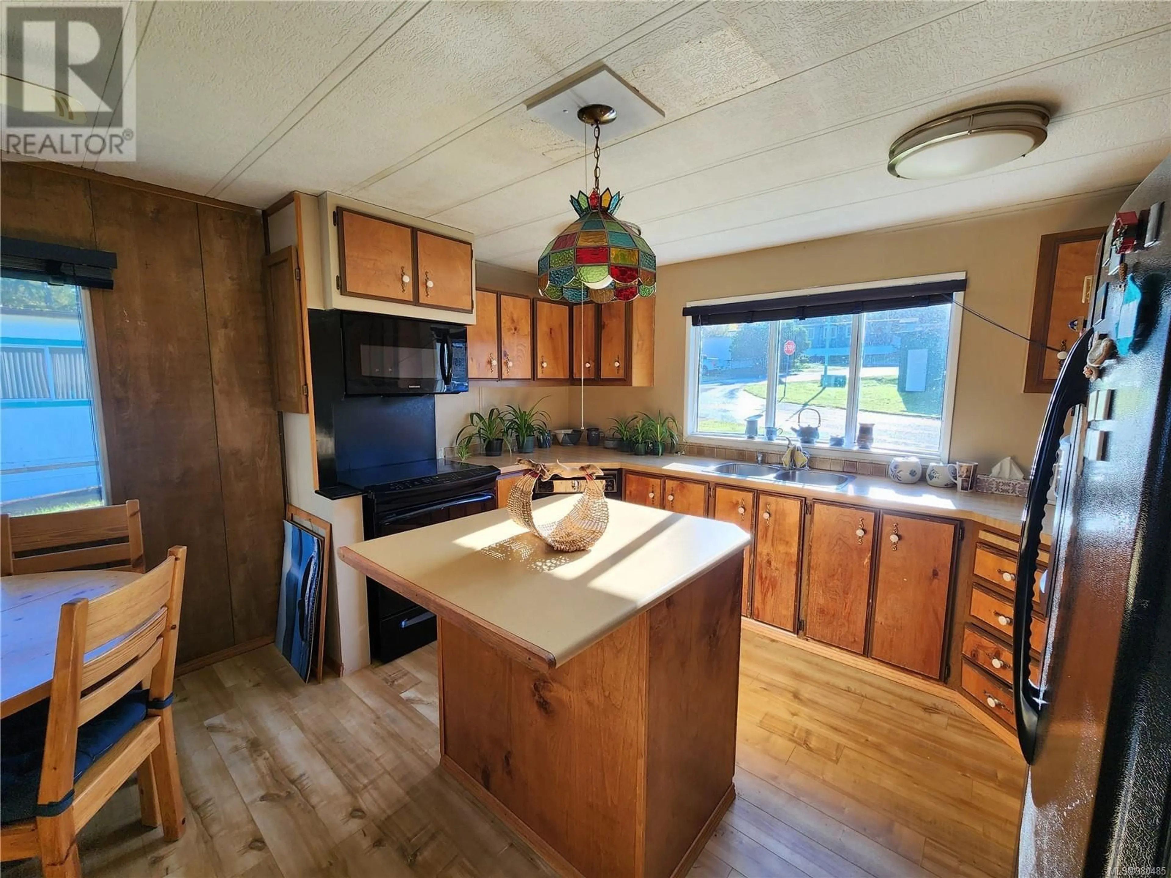 Kitchen, wood floors, cottage for 18 5250 Beaver Harbour Rd, Port Hardy British Columbia V0N2P0