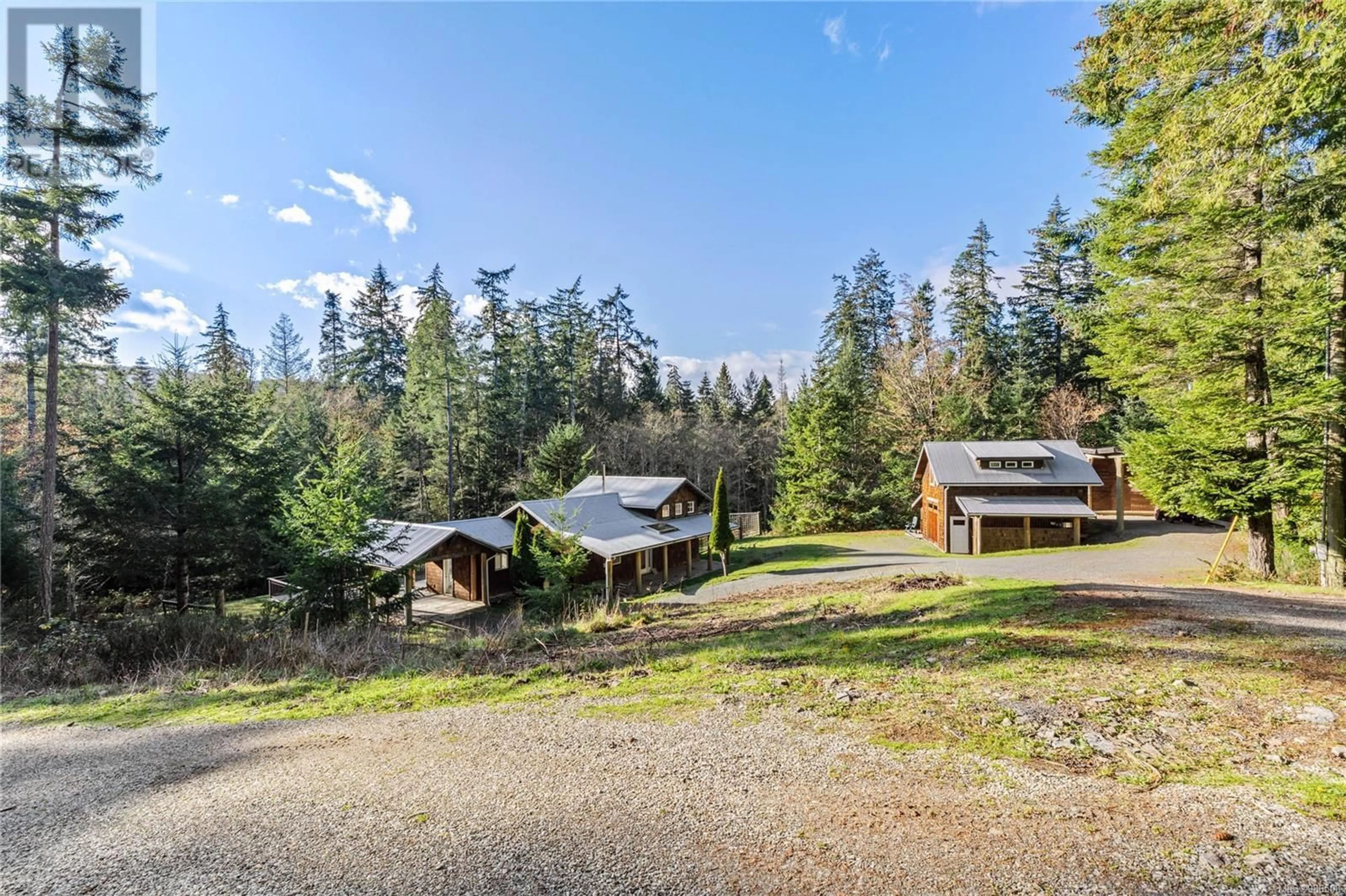 A pic from outside/outdoor area/front of a property/back of a property/a pic from drone, forest/trees view for 211 LONG HARBOUR ROAD, Salt Spring British Columbia V8K2K9